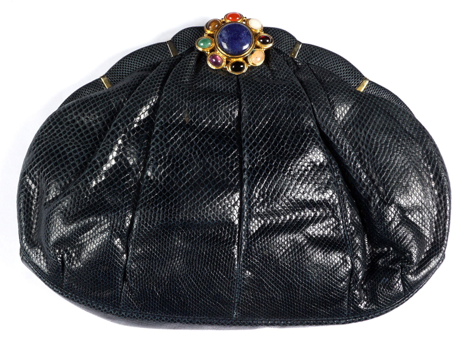 Judith Leiber Deep Blue Lizard Clutch Purse: Jeweled gold toned clasp, deepest blue lizard skin body, sold with the strap. Overall 9" x 12.25". Condition: Minor signs of wear.