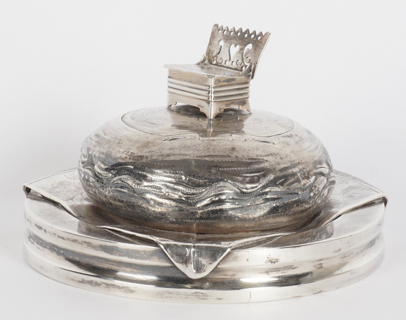 1871 Unusual Large Russian Silver Master Salt: Bag form master salt, vermeil interior, hinged lid with throne salt chair finial with hinged seat as well. Bag rests on stylized carpet, above round base. Unknown silversmith hallmark, 1871 assay date
