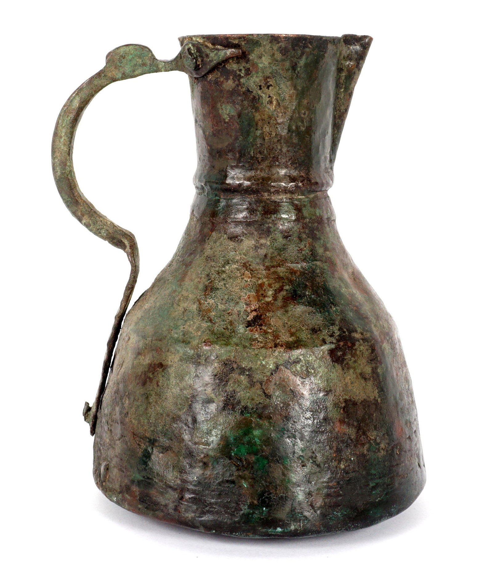 12th C Byzantine Bronze Pitcher / Vessel: Byzantine empire bronze pitcher / water vessel, 12th century,. 9.5" h. x 7.75". From a private Florida collection, sold with 1979 certificate from Farid Ziade. Condition: Pinhole in base.