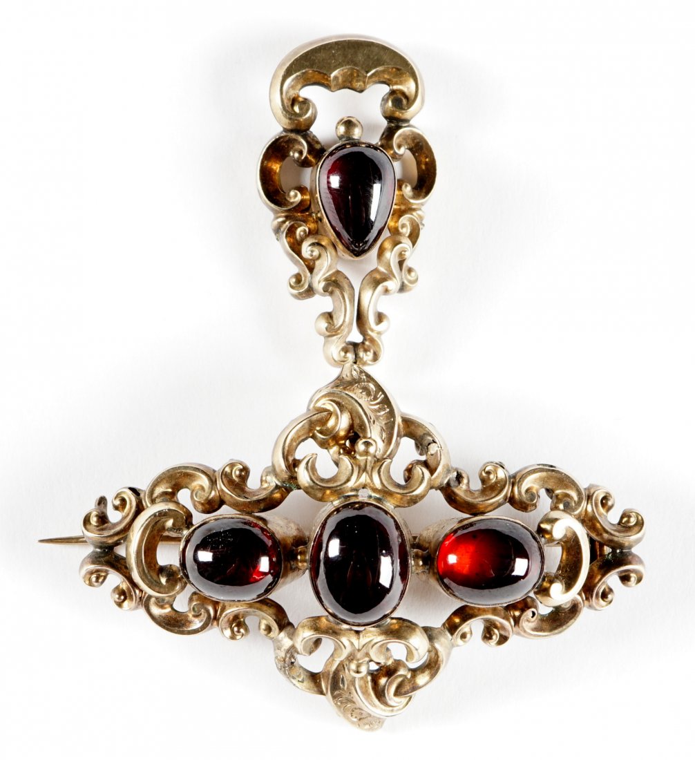 Victorian Gold and Garnet Brooch: Yellow gold and garnet cabochons pin back brooch, no visible markings, overall 2.75" x 2".