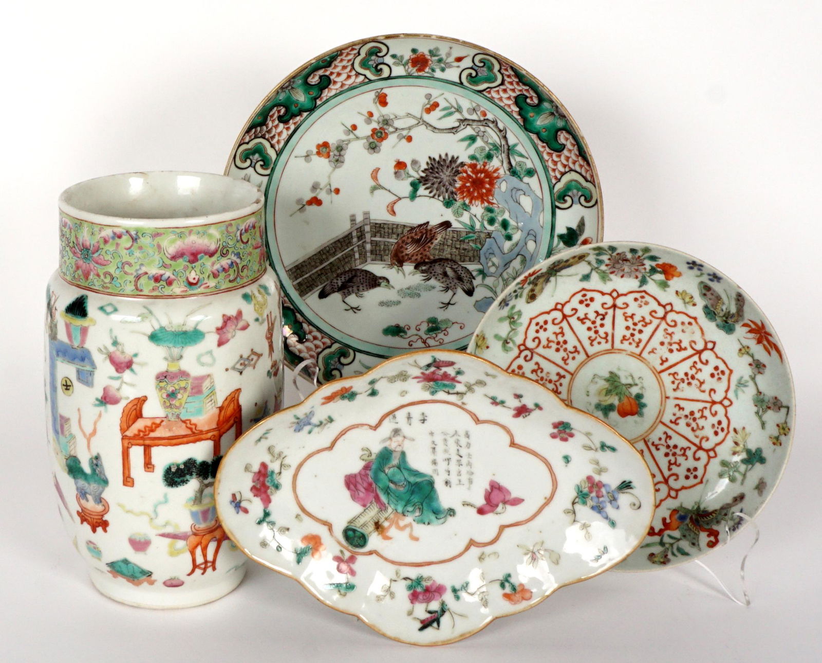 Four Piece Chinese Famille Rose Vase, Plates, Tray: An assembled collection of four pieces total to include 1) Vase decorated with bats, foliate, and precious household items, illegible red mark and wax seal on base, 9" h. x 5.5". Chips and repair to r