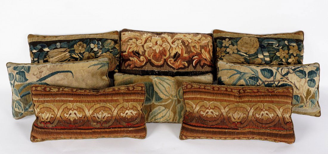 Eight 18th Century Aubusson Throw Pillows: Eight throw pillows constructed from 18th Century aubusson tapestry remnants, suede backs, each approx. 16.75" x 9.5" x 4".