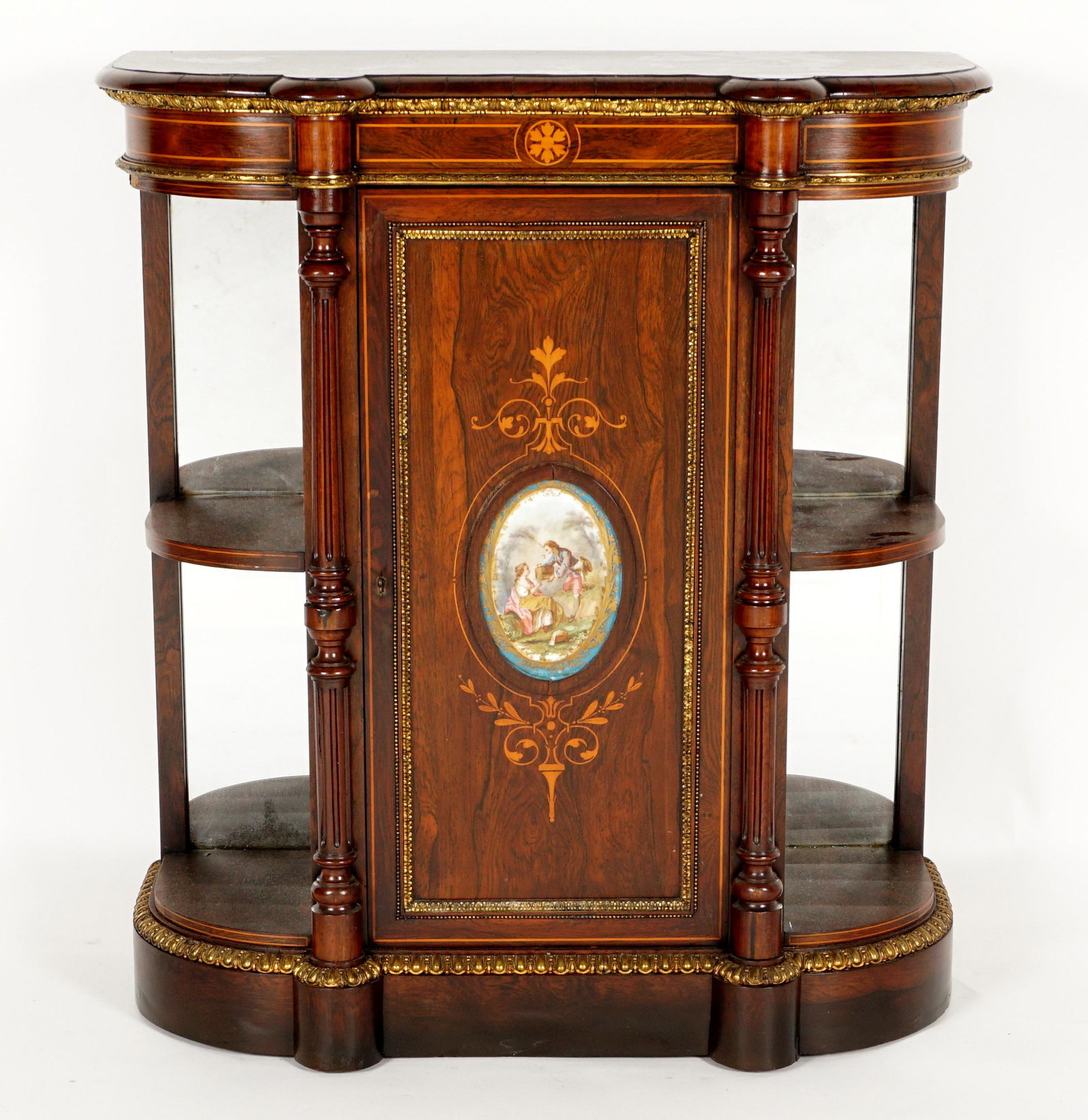 Louis XVI French Inlaid Rosewood Cabinet: Shaped top, pediment with center inlaid medallion and string inlay. Single door with applied Sevres style plaque of lovers and inlay, fluted half column stiles. Flanked on either side with two mirrore