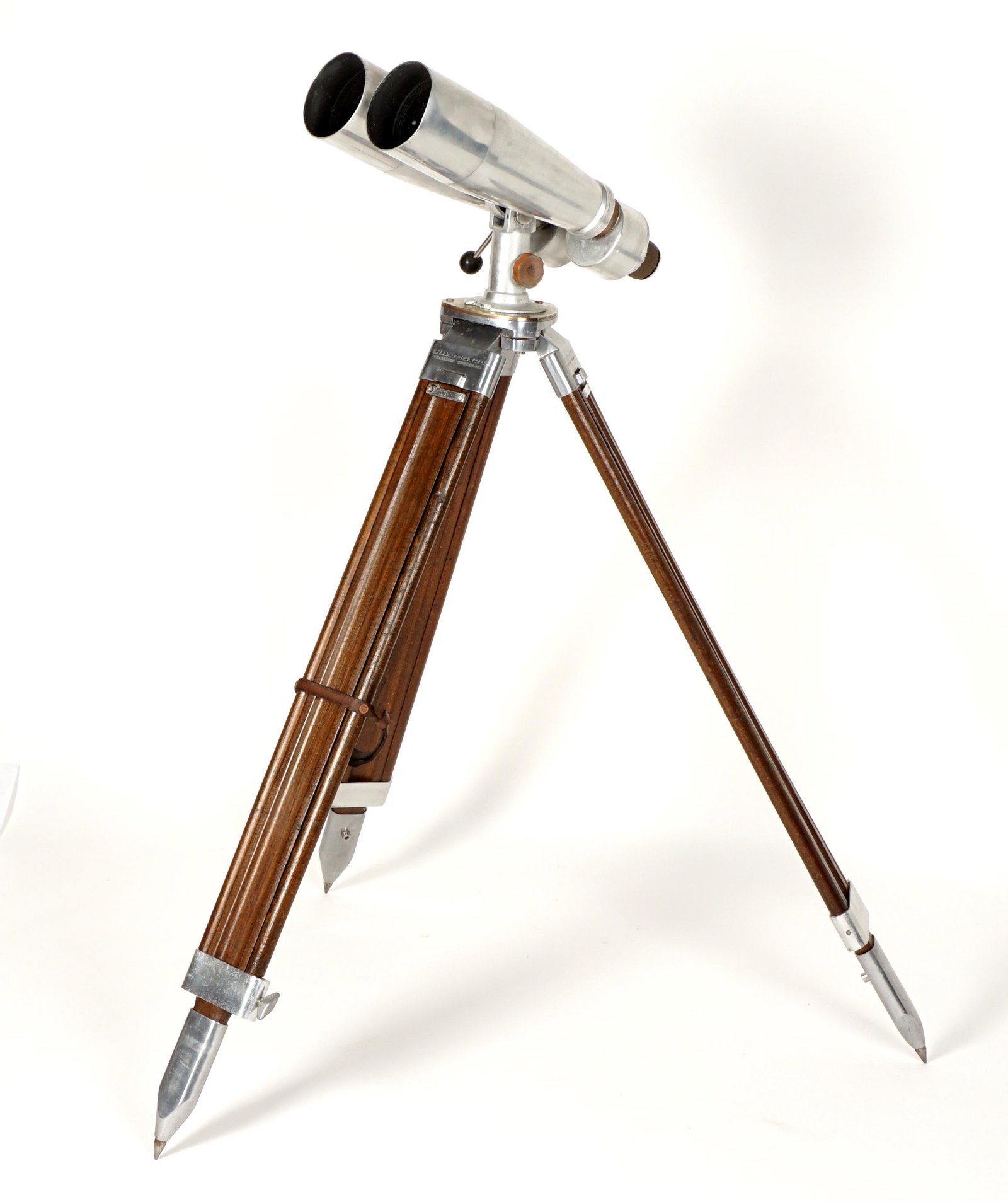 Fuji Meibo 15 x 80 Naval Binoculars and Tripod: Serial number 2564, nickel / chrome finish, on Wild GST20 Heerbrug tripod. Binoculars measure 18.5" x 8.5", tripod 50" h. Condition: Optics appear to be in good condition, left focus eyepiece is froze