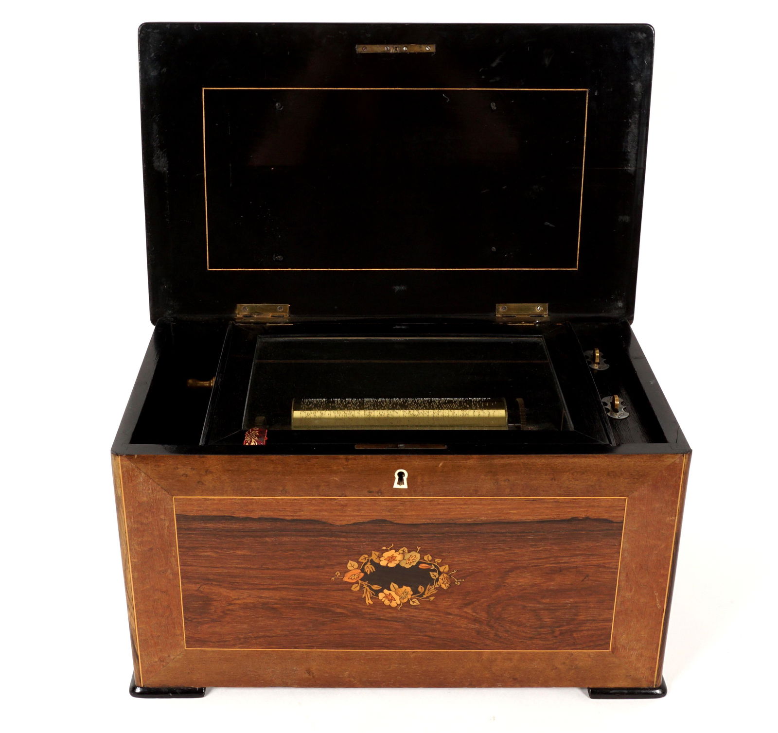 Inlaid Swiss Cylinder Roll Music Box: Early 20th Century. Hinged lid and front with floral marquetry medallions and string inlay. 7.5" brass cylinder roll movement, all teeth intact. Currently running fine however not guaranteed to contin