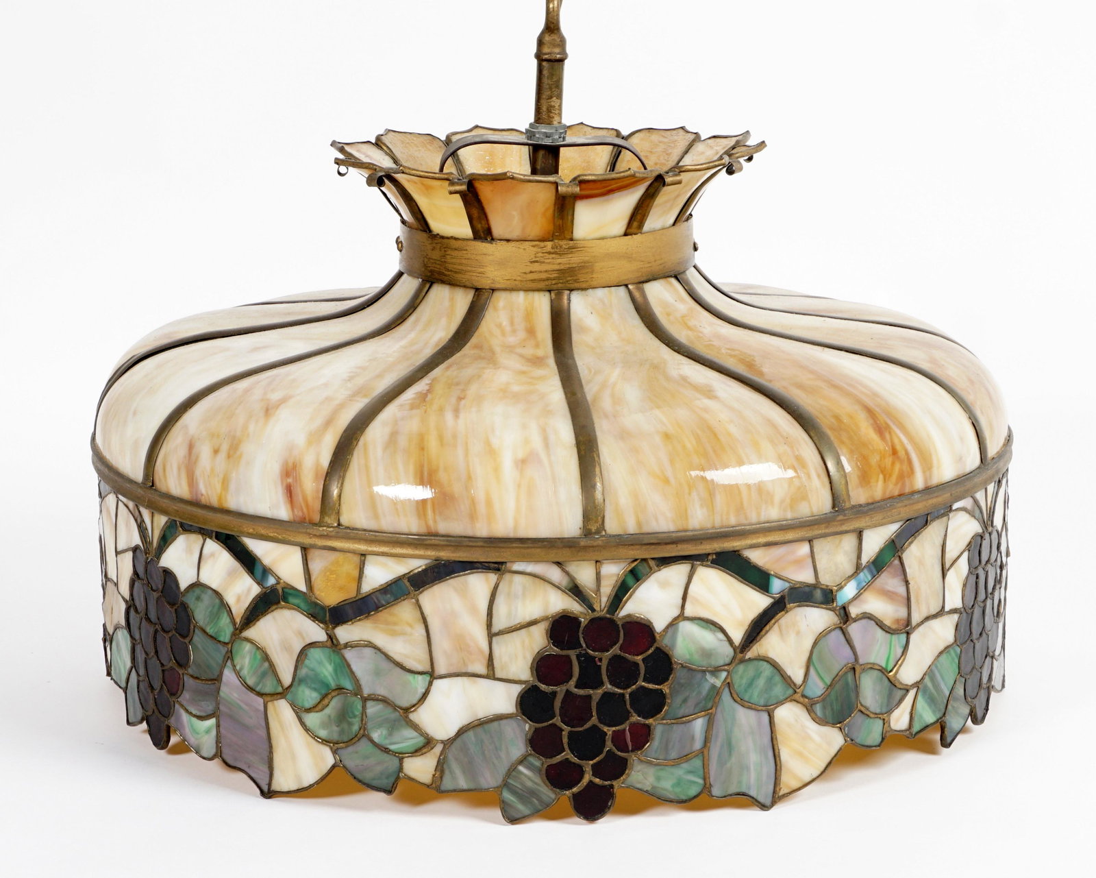 Rockefeller Estate Tiffany Style Hanging Light: Tiffany style grape vine motif with shaped slag glass panels, triple socket fixture, overall 15" h. x 24". From the Elisabeth Rockefeller Bowler Estate, great granddaughter of Franklin Rockefeller, yo