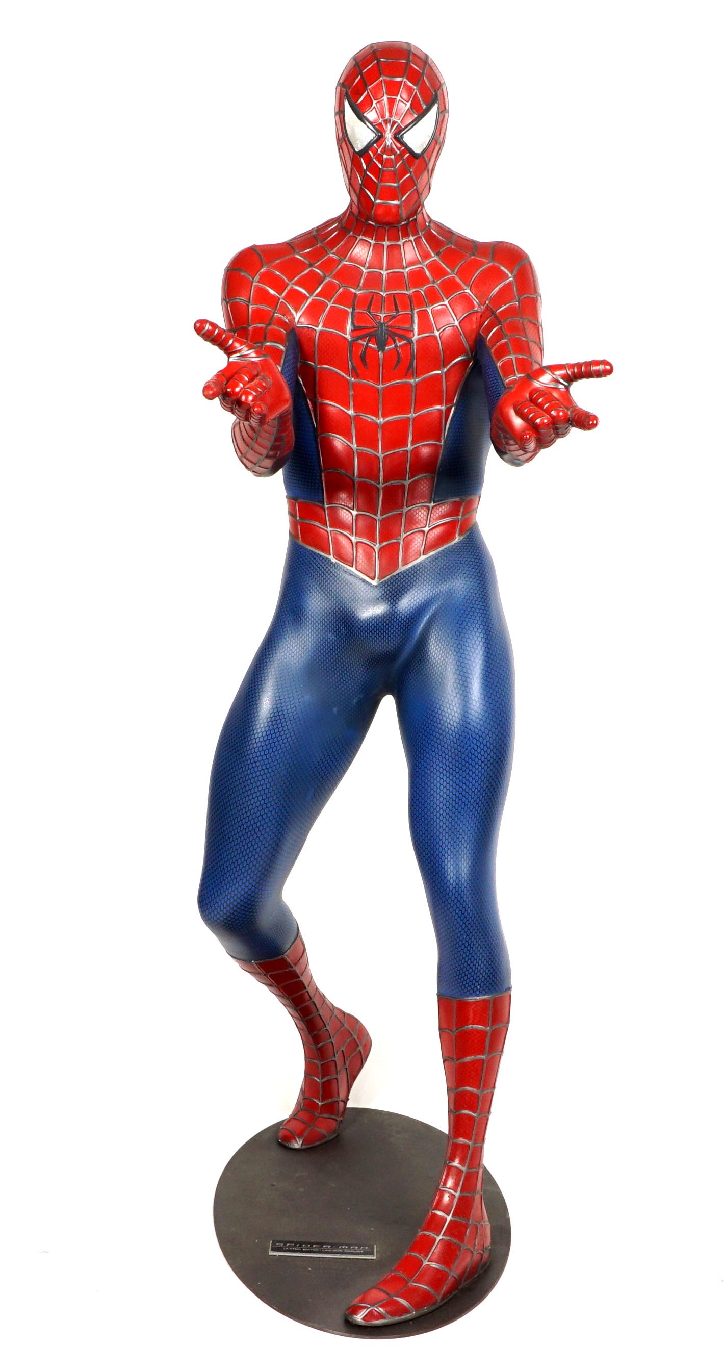 Life Size Resin Spider-Man Figure: A full live size limited edition figure of everyone's favorite web slinger, Spider-Man, based on font of plaque most likely for the 2002 movie release. overall measures 68" h. x 20" x 36".