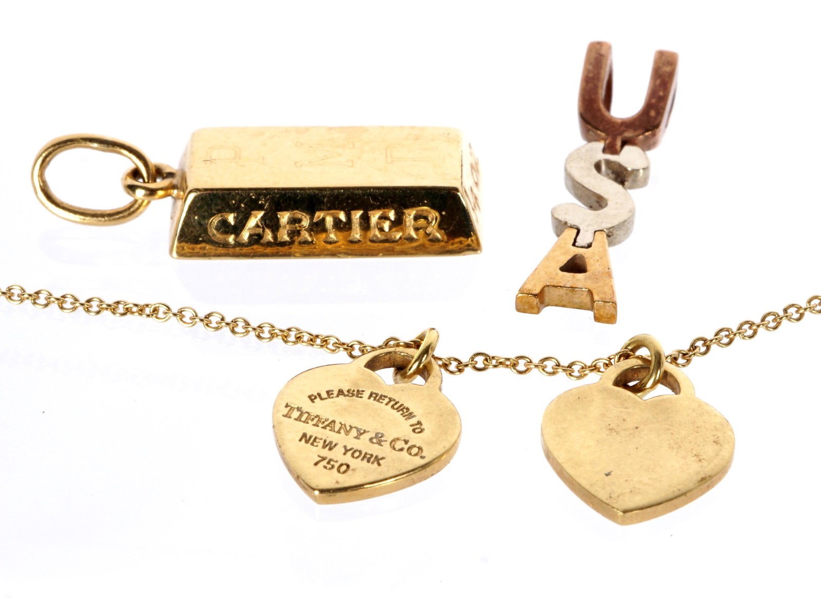 18k Tiffany Gold Necklace Cartier Gold Bar Pendant: Three pieces total to include 1) Tiffany & Co. 18k yellow gold necklace with two heart pendants, 15.75" long, approx. 4 grams. 2) Cartier 18k gold bar pendant, monogrammed, .75" h., approx. 8 grams. 3