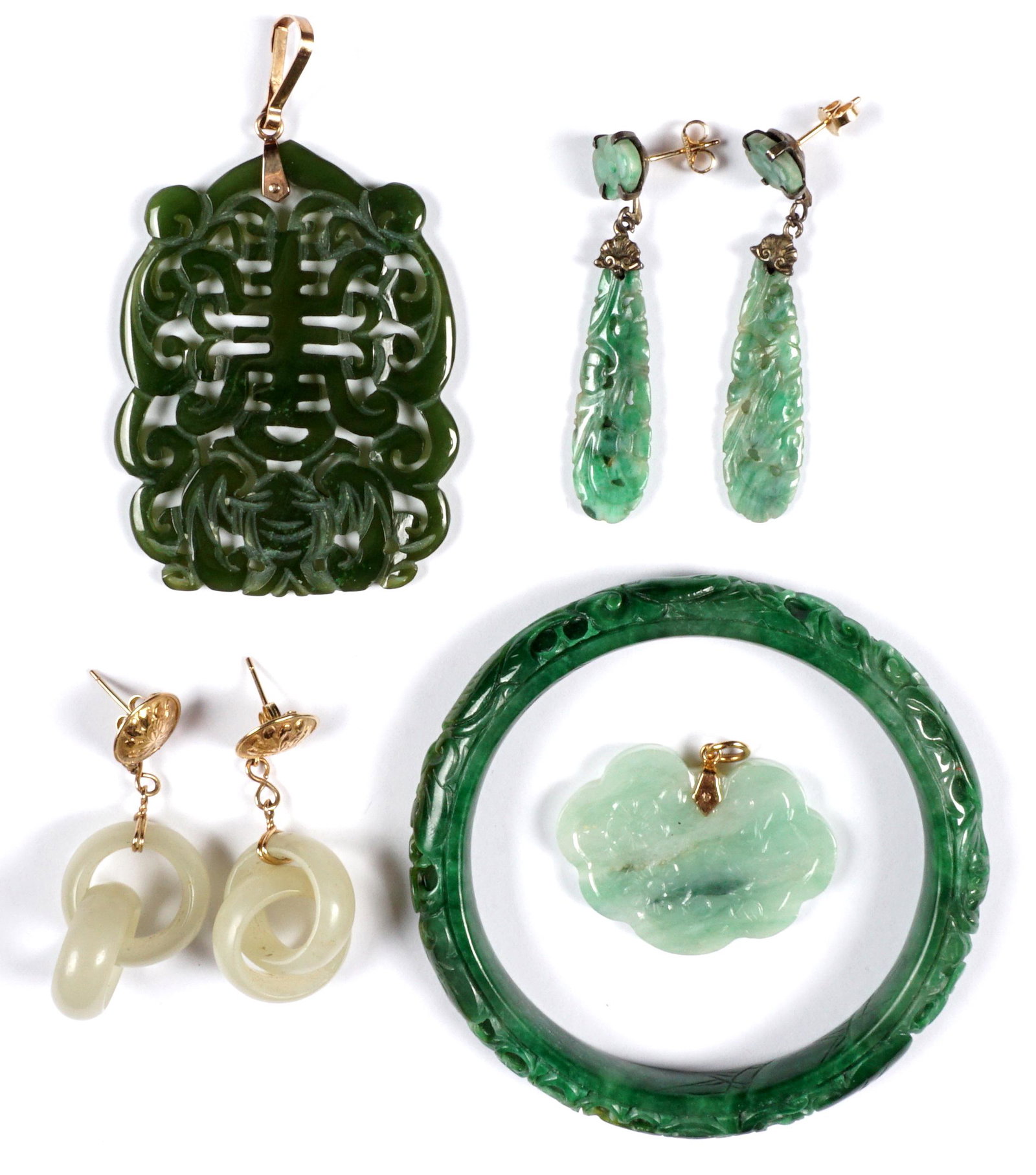 Five Piece Collection of Gold and Jade Jewelry: Five piece total to include 1) Pierced carved pendant, 18k gold bail,2.25" x 1.75". 2) Foliate and bird motif carved pendant, 14k gold bail. 3) Pair Mings gold and jade intertwined jade rings earrings