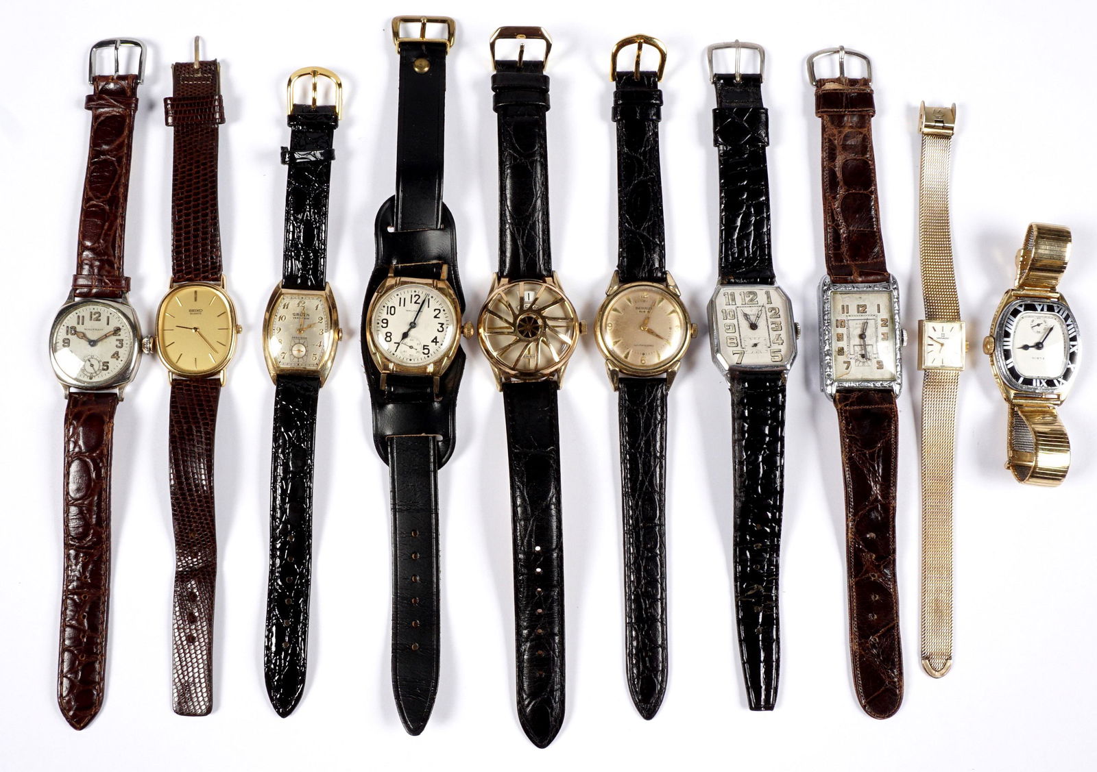 Estate Collection of Wrist Watches: An assembled collection of ten watches total to include Banner, two Waltham, Gruen, Seiko Quartz (need battery), Elgin, two Benrus, Movado gold filled, Asra 9not running). Condition: All running unles