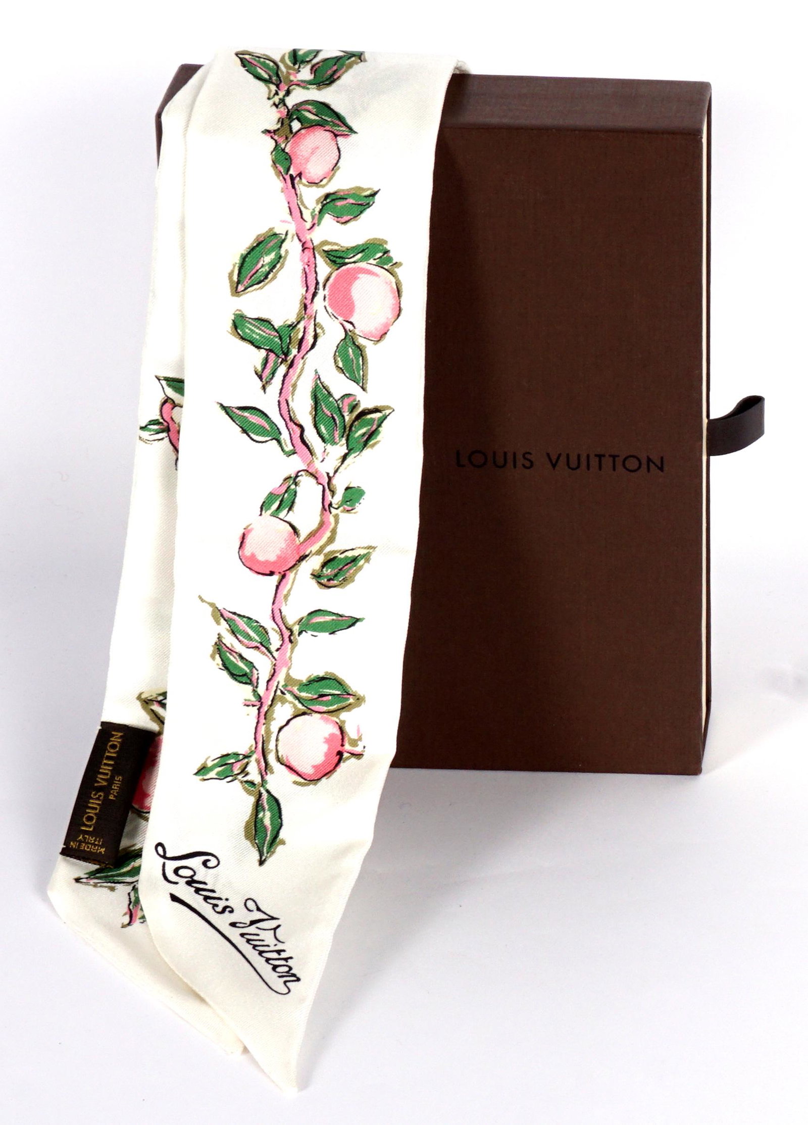 Louis Vuitton Silk Stole with Box: Cream ground, branches with pink fruit motif, measures 58.5" x 2.5". Sold with the original box.