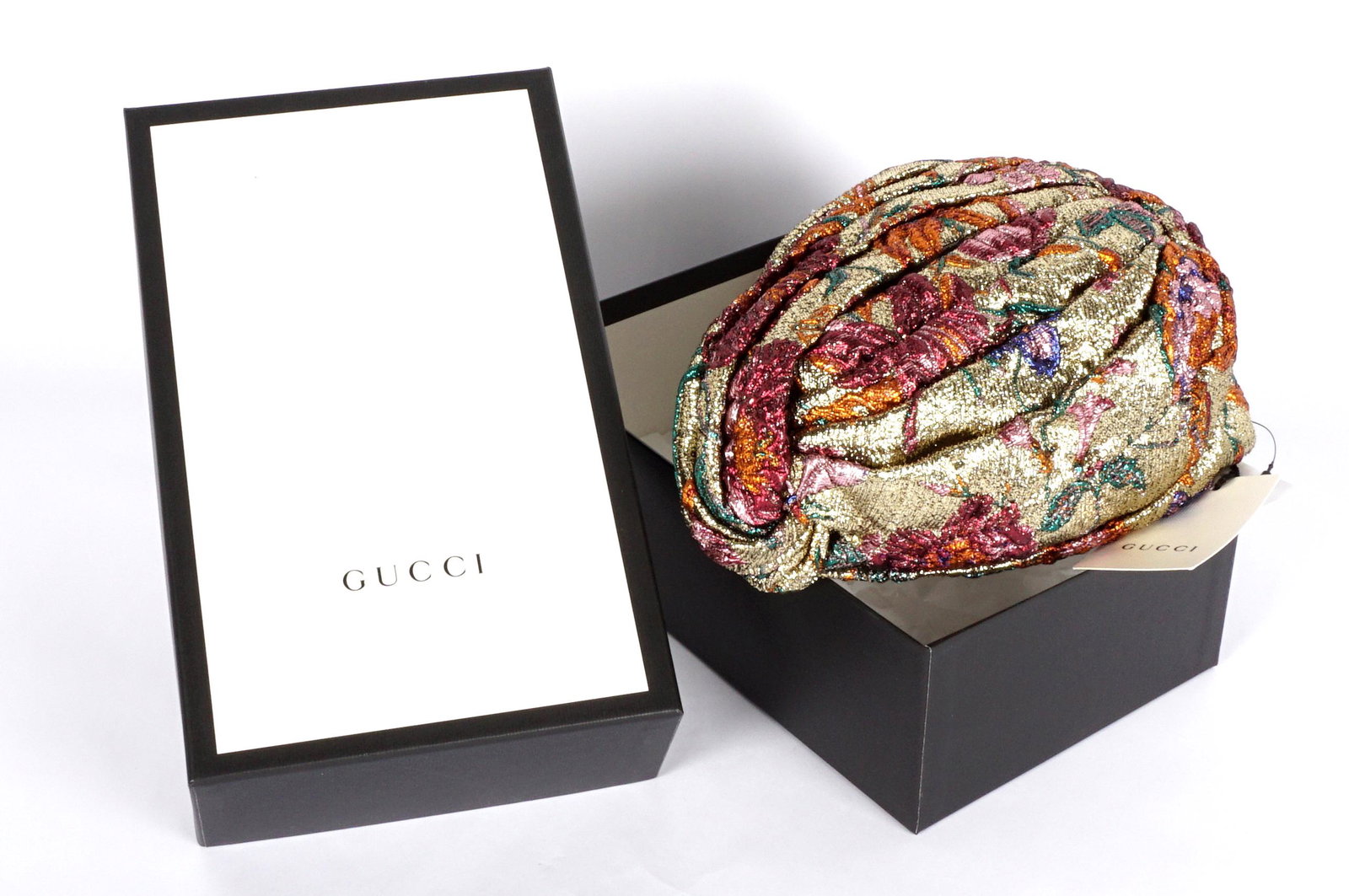 Gucci Metallic Floral Brocade Turban Hat: Gold metallic floral motif, size M 57, sold with a Gucci box. Overall condition excellent with tags.