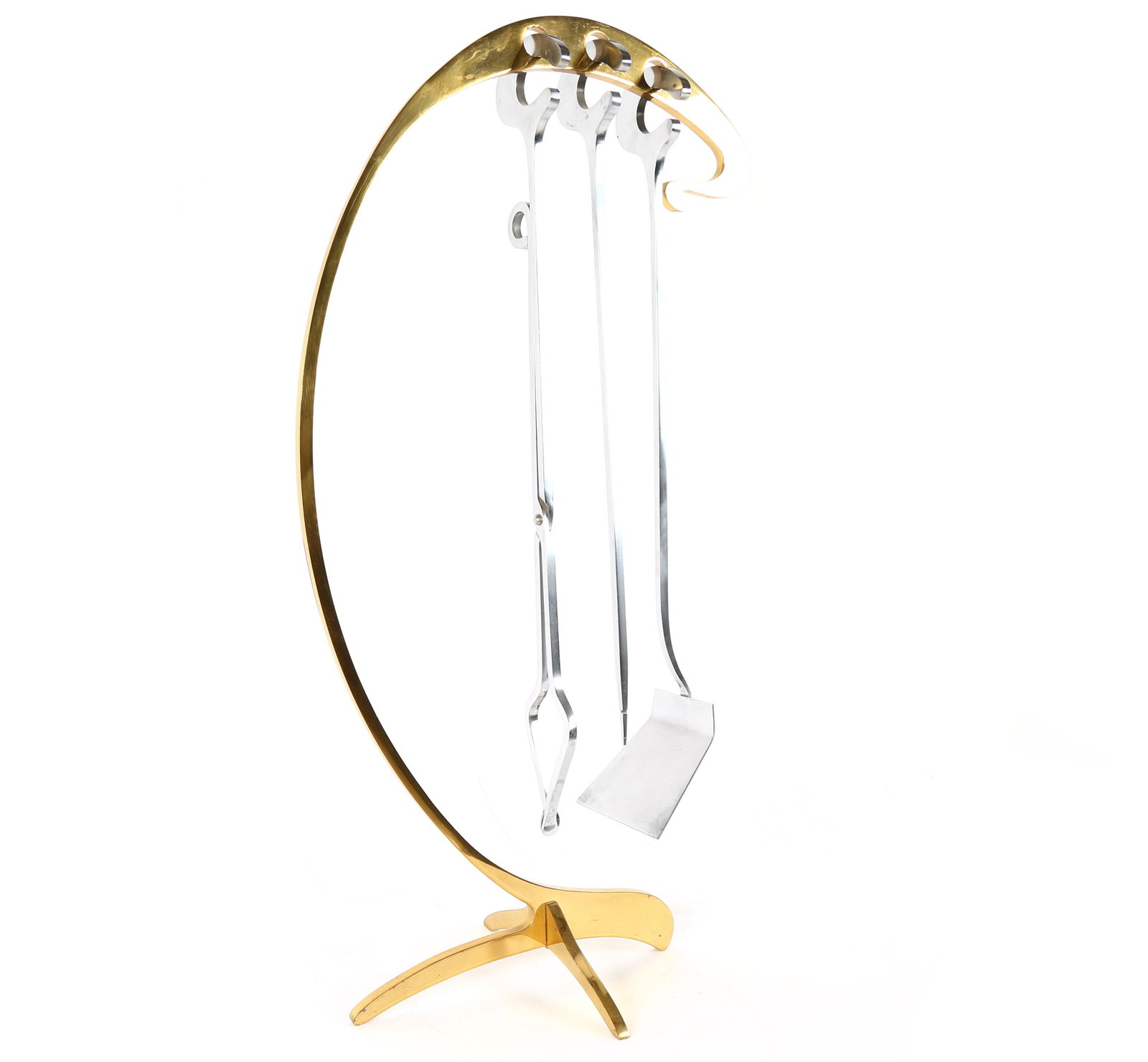 Jacques Charles 4 Piece Ligne Inox Fireplace Set: Circa 1960's four piece stainless steel and brass fireplace set designed by Jacques Charles, unmarked, overall 30" h. x 15" x 9". Condition: Minor spotting to brass at base.