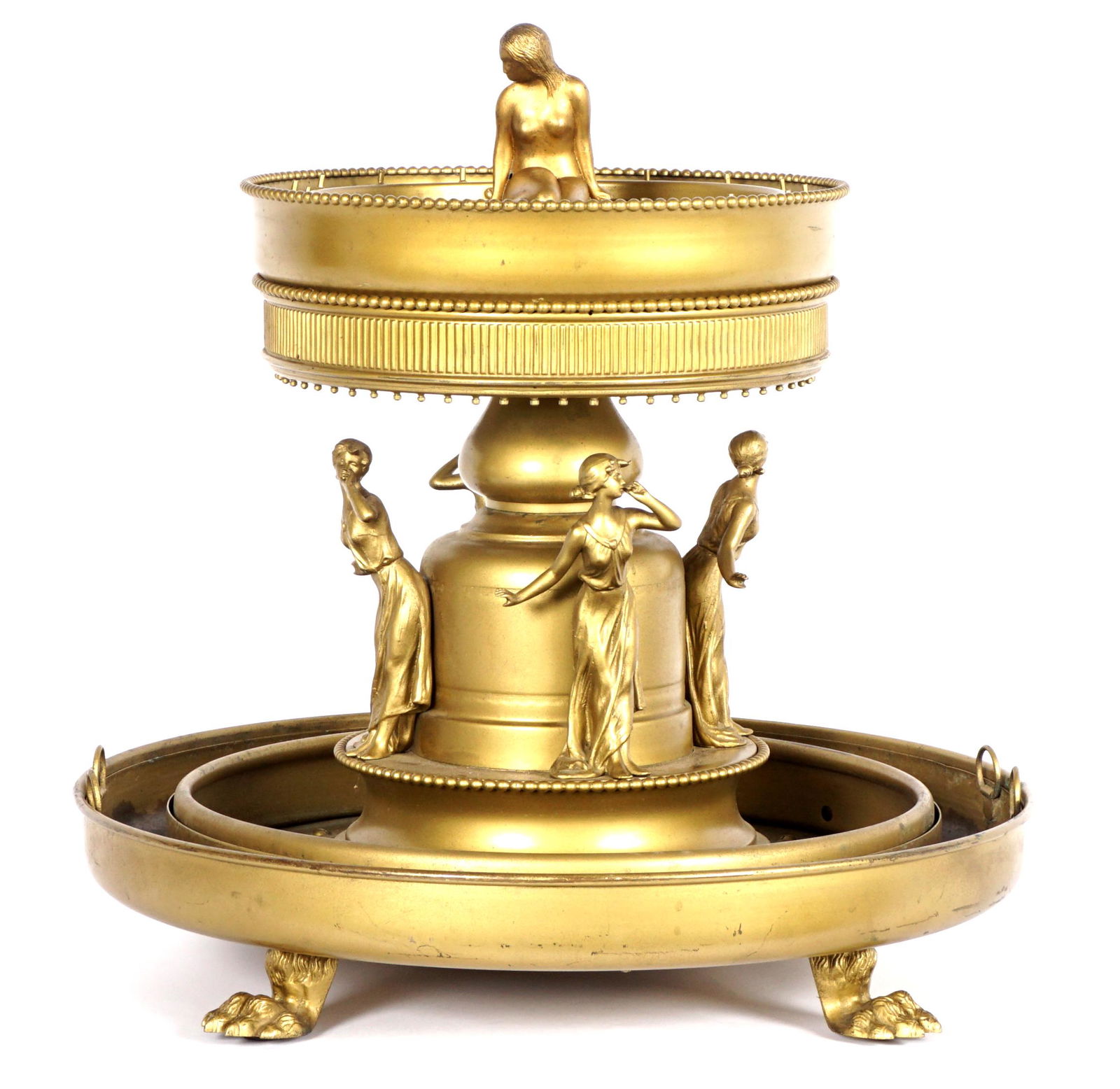 Continental Art Deco Figural Table Fountain: Gilt metal table fountain, spelter mermaid finial over glass spill level, center column with four figural spelter women, lower reservoir on four paw feet. Three switches, removable plug, we have not d