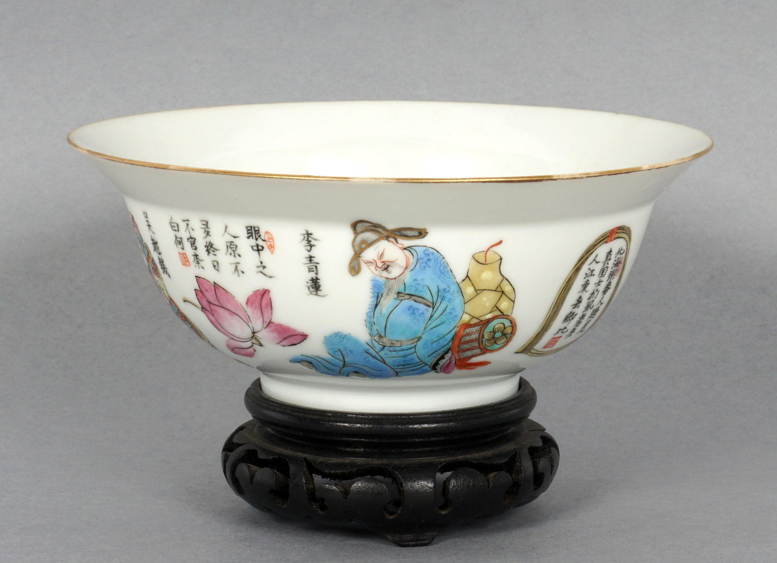 Chinese 19th C Qing Famille Rose Wu Shuang Pu Bowl: 19th Century white ground porcelain bowl with decorates with Wu Shuang Pu style story exterior, bears a red Daoguang mark on base, 2.25" h. x 5.5" dia. Sold with wood stand. Condition: Hairline crack