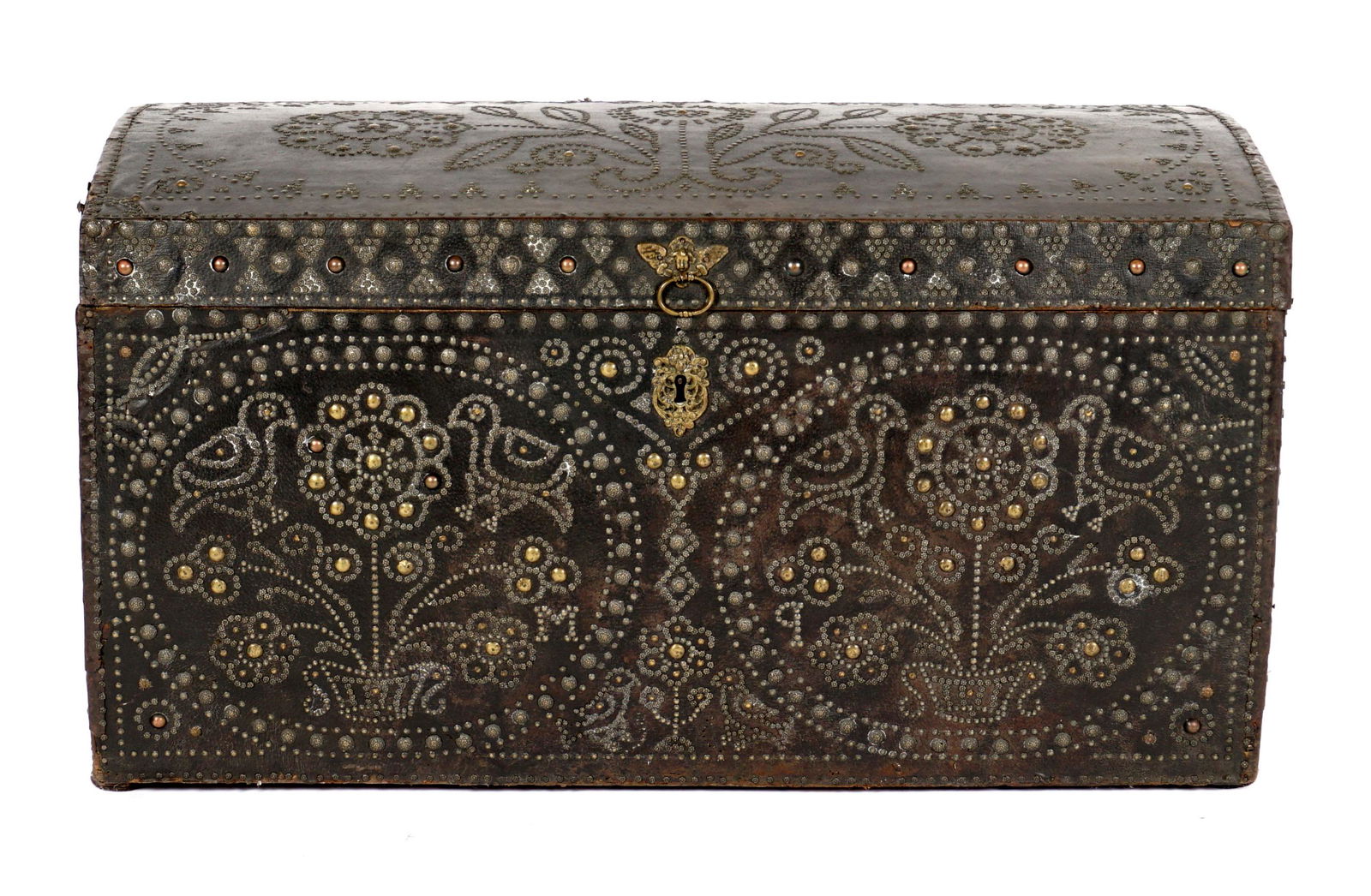 Italian Leather Clad and Brass Tacked Trunk: Leather clad all over, hinged dome top, brass tacked floral design, front with birds and floral tacked design, iron handles, relined interior, 24" h .x 44" x 23.5". Condition: Wear to leather.