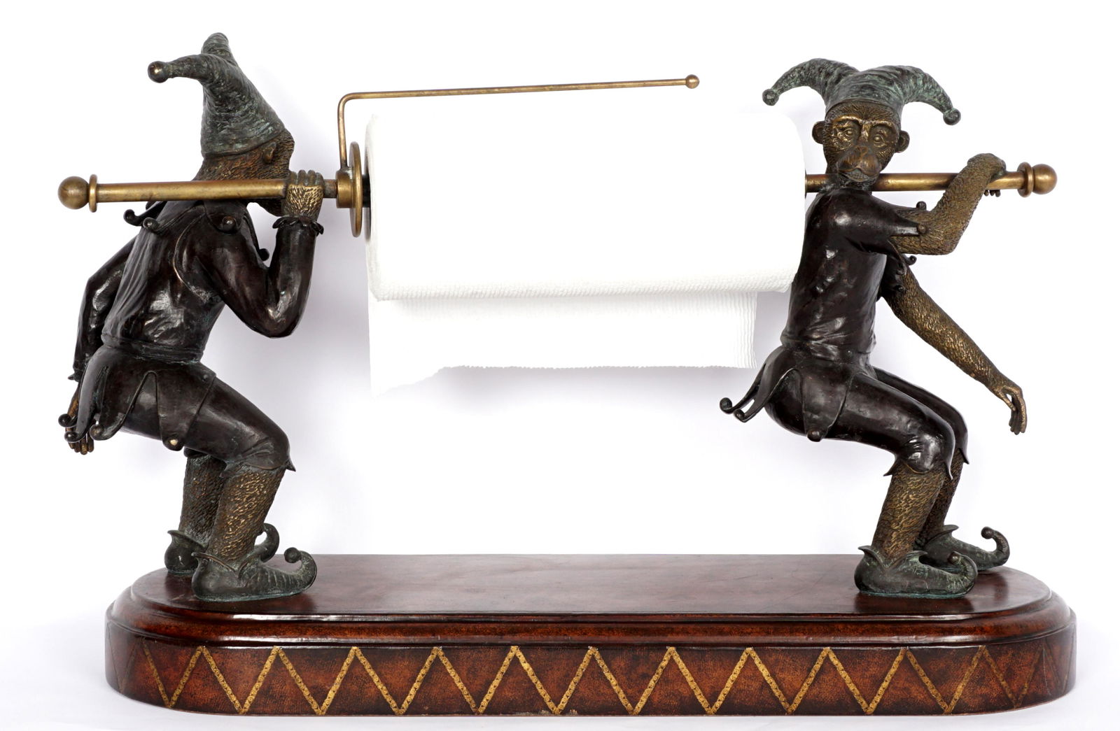 Maitland-Smith Jester Monkey Paper Towel Holder: Two cast bronze figural monkeys modeled as jesters holding a paper towel holder rod, leather wrapped base, Maitland-Smith tag on base, overall measures 17.75" h. x 28" x 9".