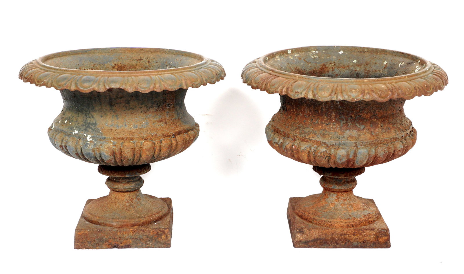 Pair French Cast Iron Garden Urns: Early to mid 20th Century cast iron garden urn planters, overall 17.75" h. x 20". Condition: Rust, obvious signs of weathering.