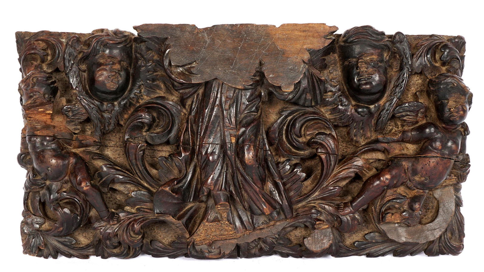 18th C. Italian Carved Figural Cherub Wall Plaque: Continental carved wall plaque, most likely Italian, with cherubs, putti, foliate scroll, and swags, overall 11.25" h. x 24" x 5.5". Conditions: Loss, age crack, and evidence of prior insect damage.