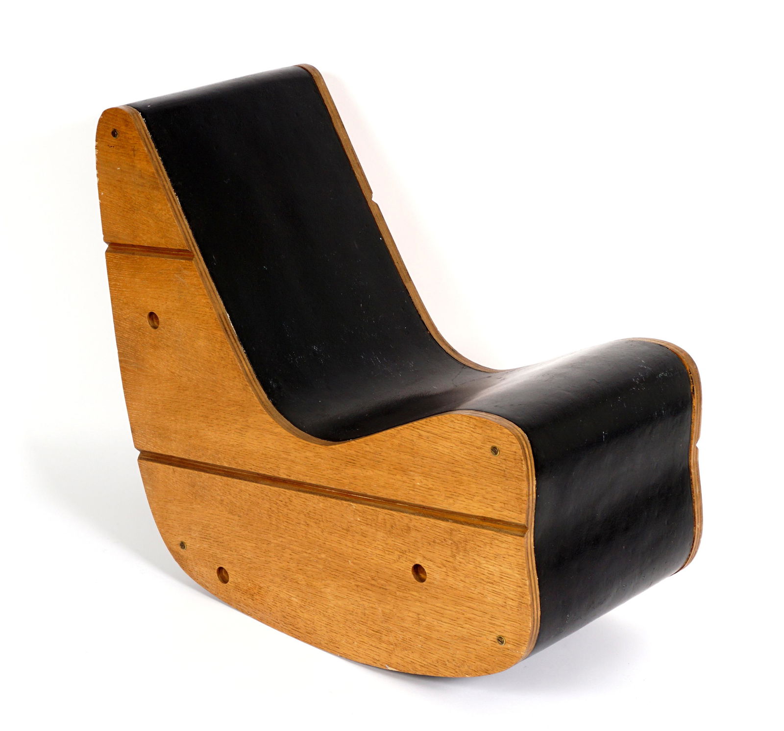 Attrib. Frederick Kiesler Correalist Rocker Chair: Oak plywood and linoleum construction, attributed to Frederick Kiesler who designed these chairs for Peggy Guggenheim's "Art of this Century Gallery". Measures 27.5" h. x 15" x 32"". Condition: Abrasi