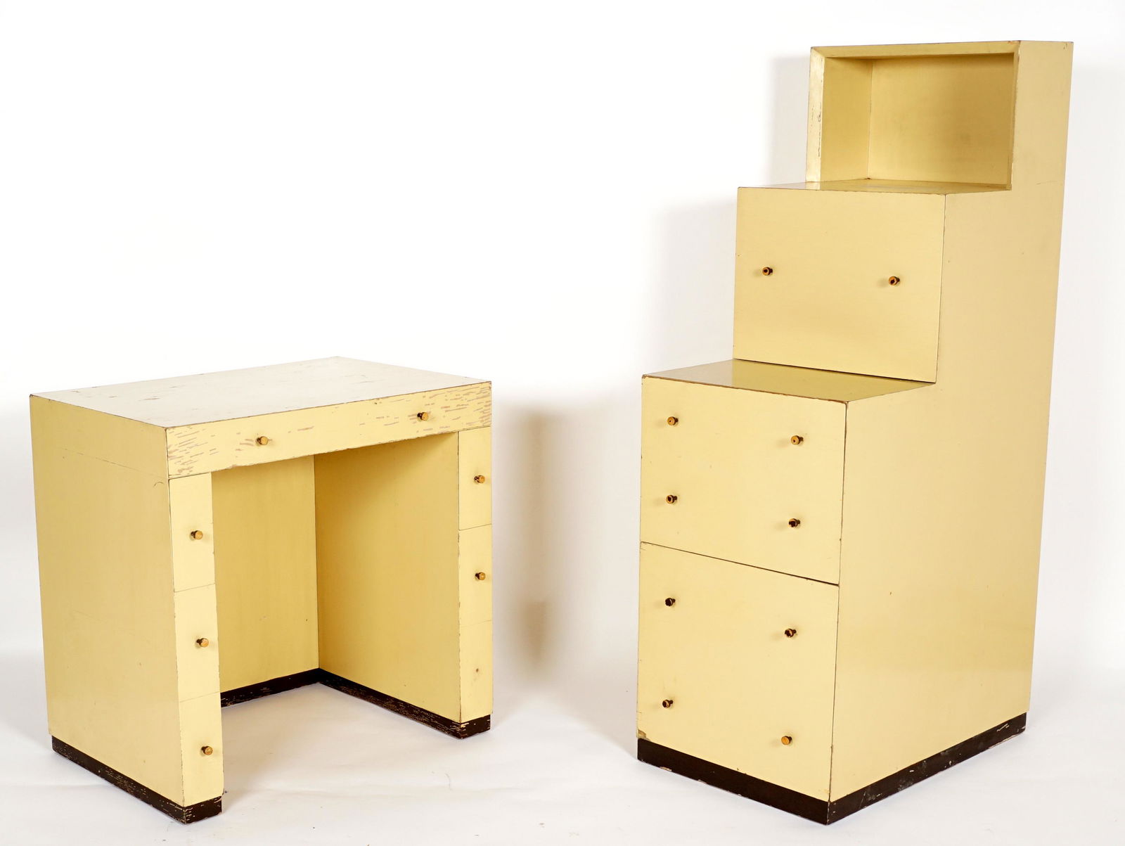 Style of Paul Frankl Skyscraper Chest & Desk: In the manner of Paul Frankl, two pieces total to include 1) Open top over stepped out single drawer over stepped out two drawers. Yellow lacquer finish, unmarked, overall 54.75" h. x 18.5" x 29". 2)