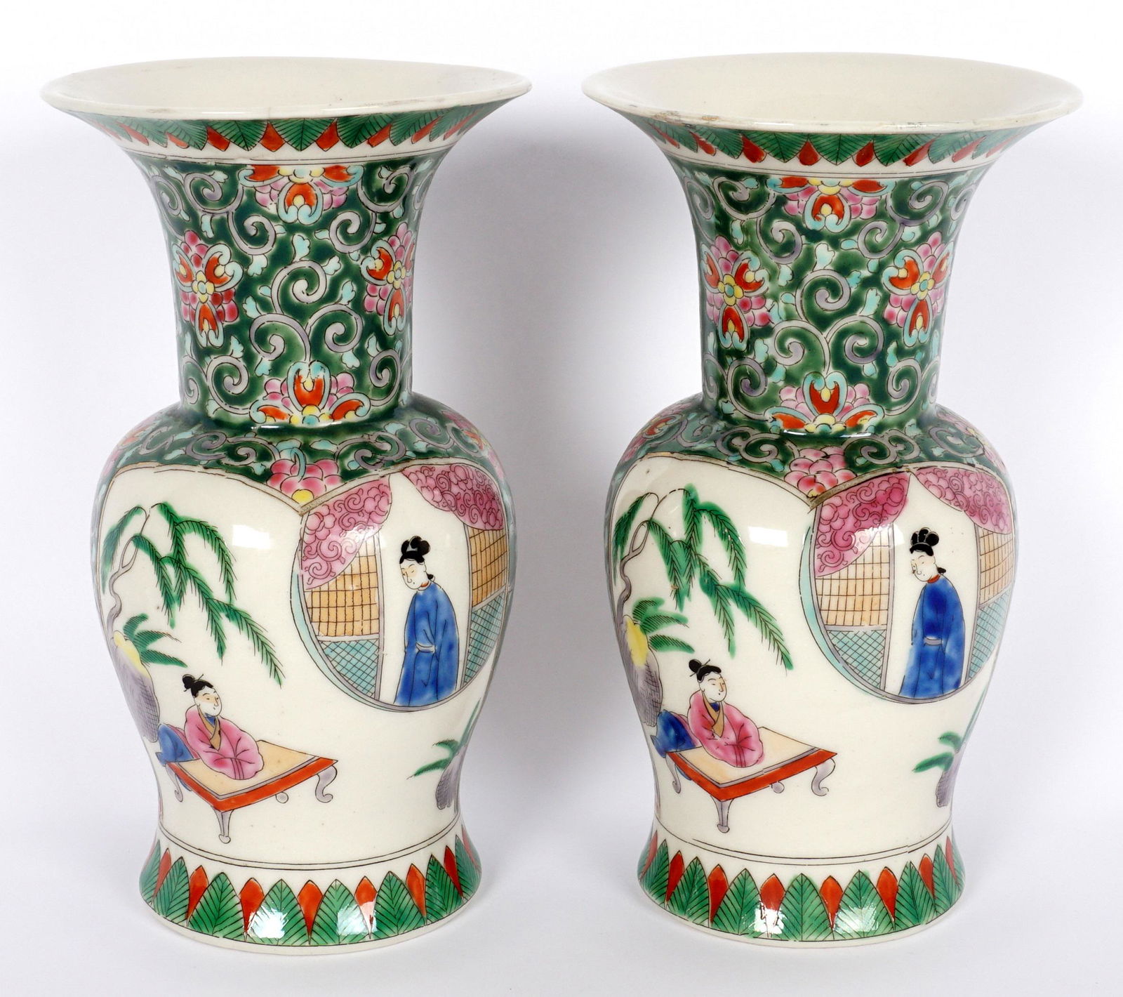 Pair Chinese Famille Rose Vases: Baluster form, green ground with floral decoration, matchings outdoor genre scenes in reserves, unknown four character mark on base, 20th Century. 7" h. x 4". Condition: One with rim chip repair, the