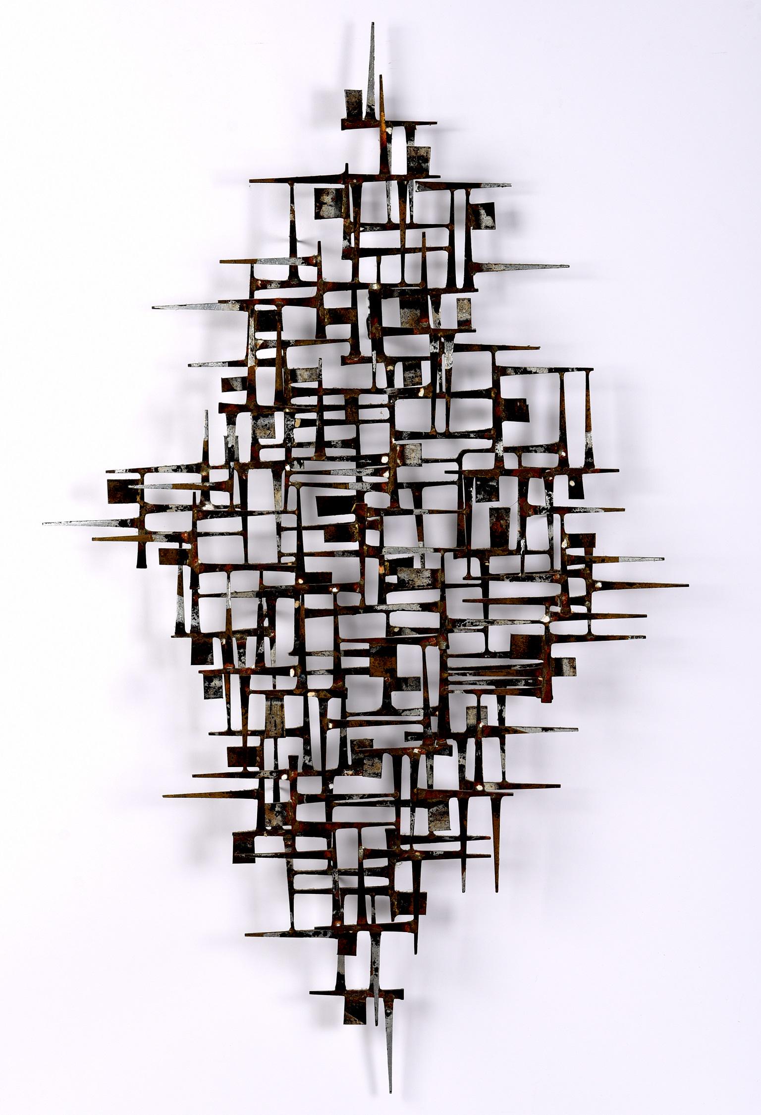 Manner of Seandel Brutalist Welded Nail Sculpture: In the manner of Silas Seandel welded nails and accents wall sculpture, overall 45.25" x 27.5" x 4.25".