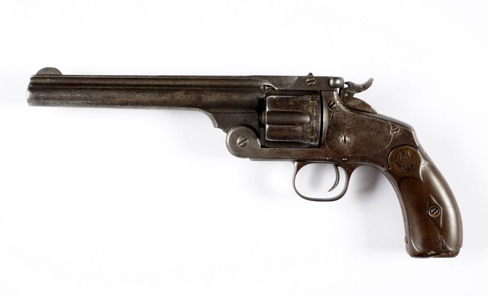 Smith & Wesson 44 Model 3 Single Action Revolver: Circa early to mid 1870's, matching serial number 14815, 6.5" round .44 caliber barrel with partial markings remaining of rib, top break access, 6 shot cylinder, hard rubber grips. Overall 11.5" long.