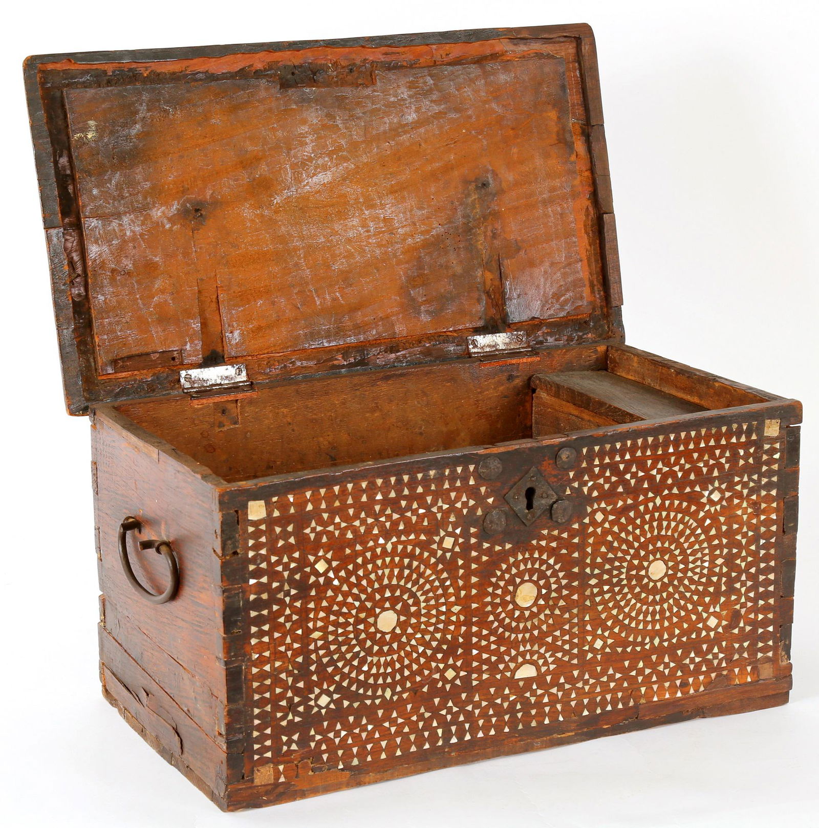 18th / 19th C. Syrian Damascus Inlaid Travel Chest: Diminutive lift top trunk / chest, profusely bone inlaid geometric design front, covered internal till, iron lock and handle, replacement hinges. Overall 9" h. x 18" x 10". Condition: Inlay loss, chip