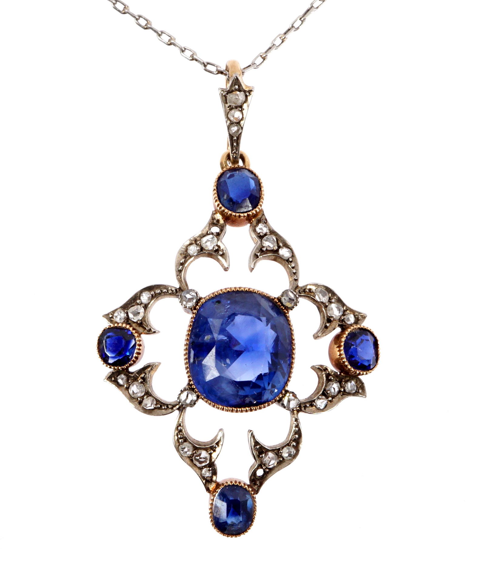 Victorian Gold Sapphire & Diamond Pendant Necklace: Nice openwork filigree quatrefoil pendant with large center sapphire, oval and round sapphires at points, filigree frame and bail with diamond accents, overall approx. 45mm h. x 25mm, unmarked white a