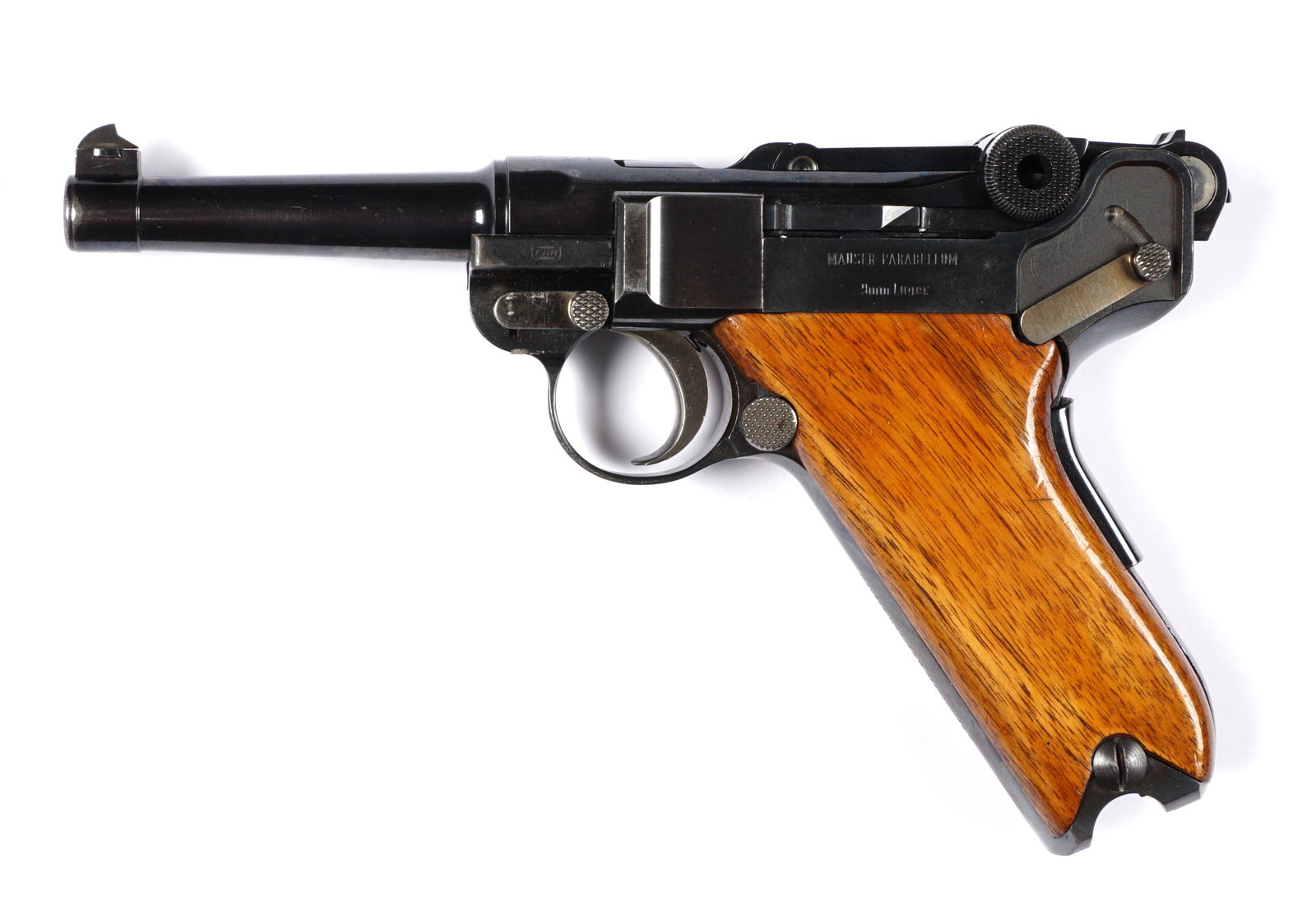 Interarms Mauser Parabellum Luger 9mm Pistol: Semi automatic 4" barrel, 9mm, blued frame, wood grips, overall 8.25". Sold with 3 magazines, booklet and hard case. Condition: Overall excellent, loss of blue at muzzle. FFL transfer required, there