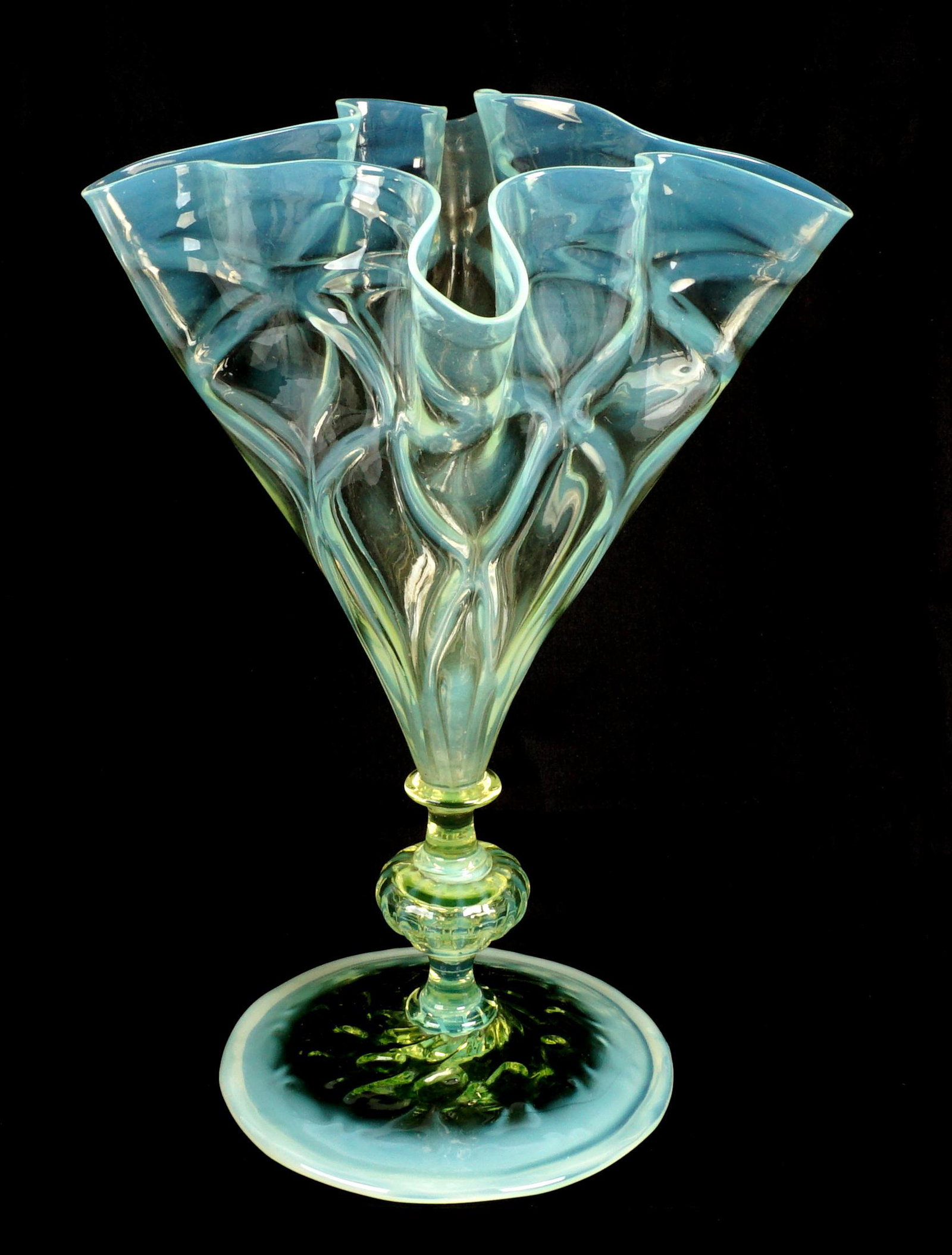 English Ruffled Vaseline Glass Vase: Ruffled molded English vaseline glass vase, dimpled foot, unmarked, 11" h. x 8".