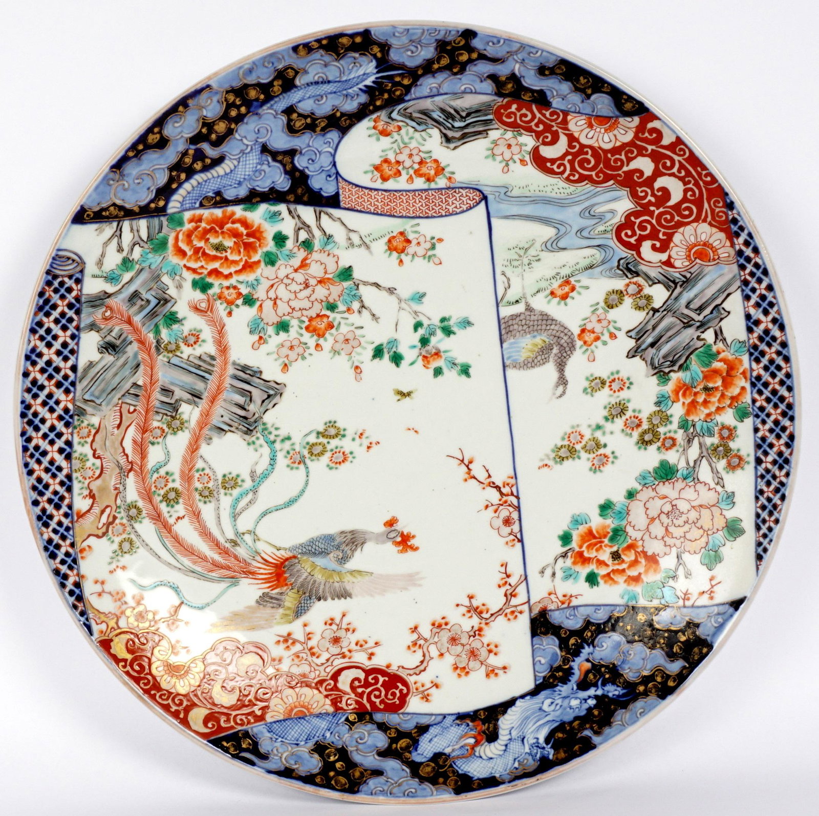 Large Japanese Imari Charger: Bird of paradise and floral motifs, unknown marking verso, 2.5" h. x 18" dia.