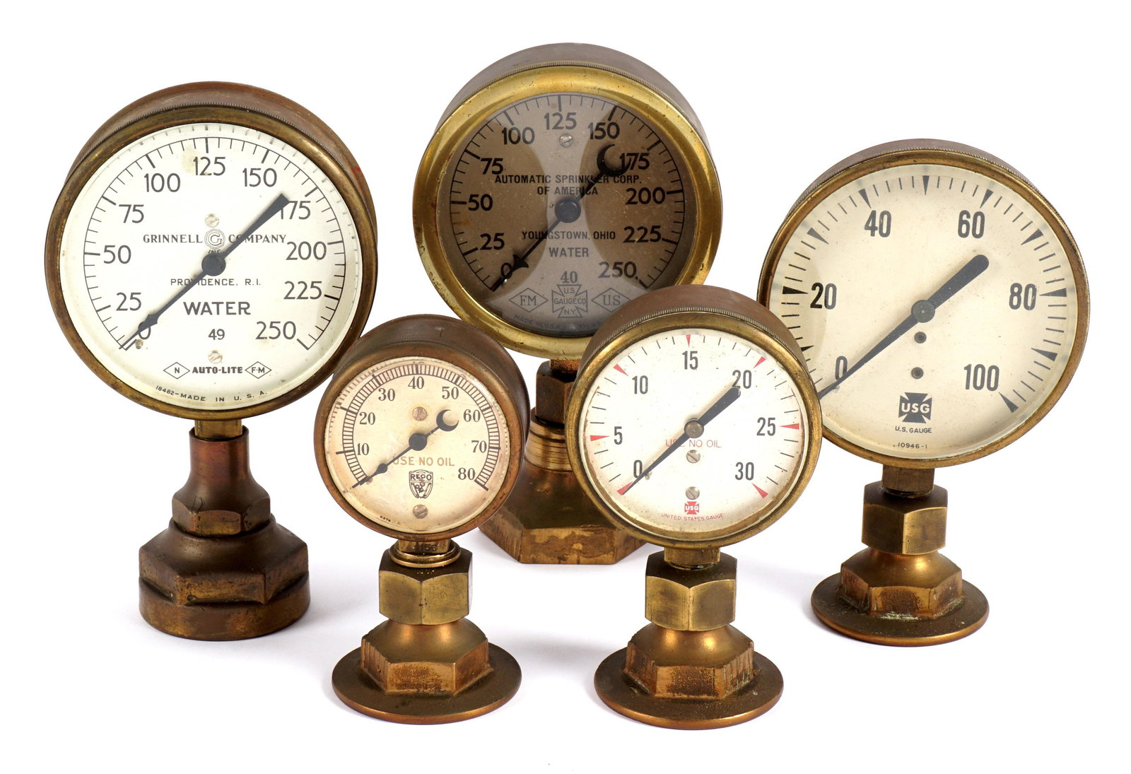 Collection of Five Brass and Bronze Gauges: An assorted collection of five water and steam gauges, three by US Gauge Co., one Auto-Lite, one Reco. Largest 6.5" h. x 3.75".