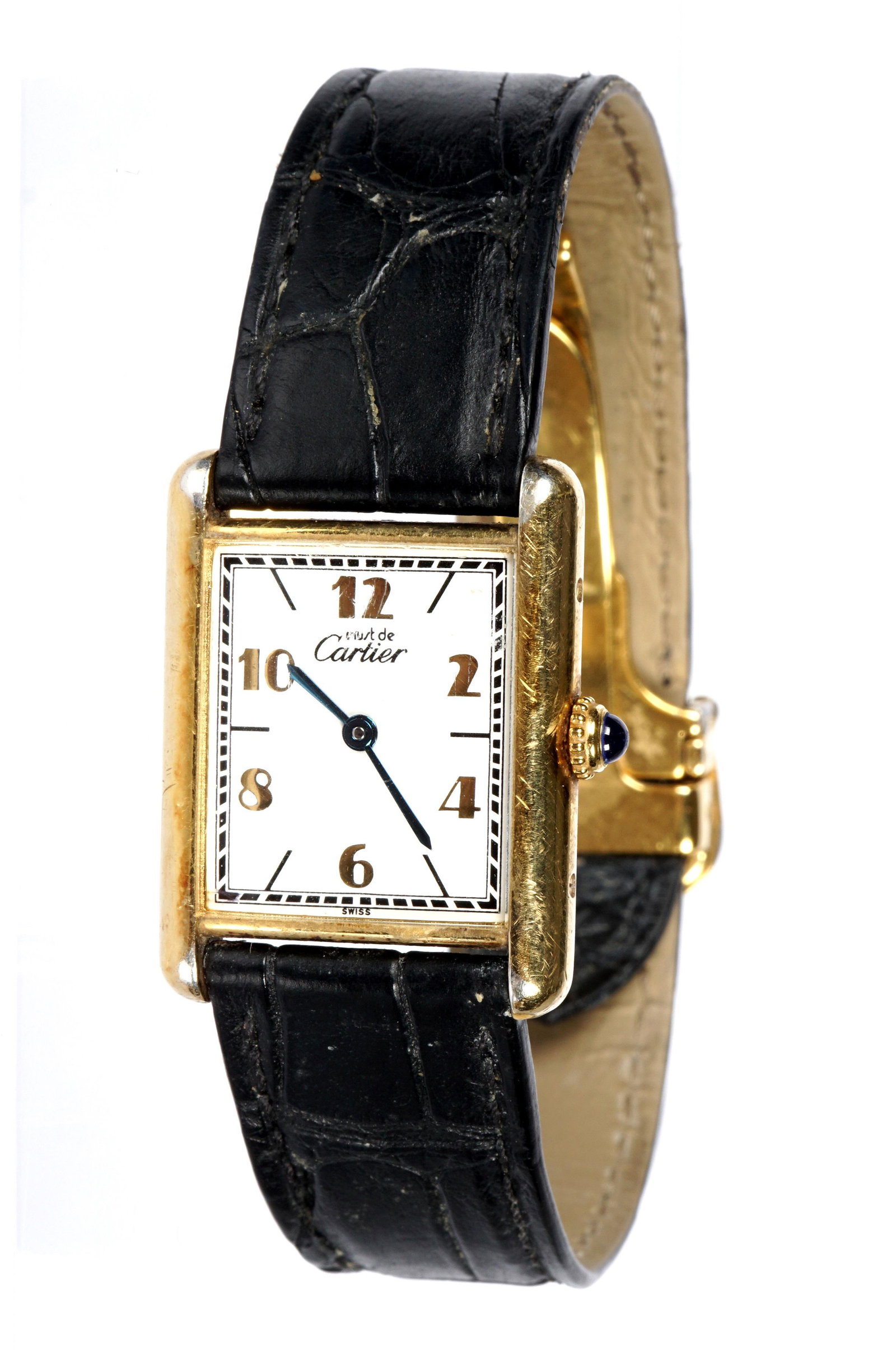 Ladies Cartier Vermeil Sterling Tank Watch: Rectangular vermeil sterling silver case, enamel dial marked Must de Cartier, quartz movement, alligator leather band. Sold with Cartier bag and original paperwork. Condition: Wear to vermeil finish,