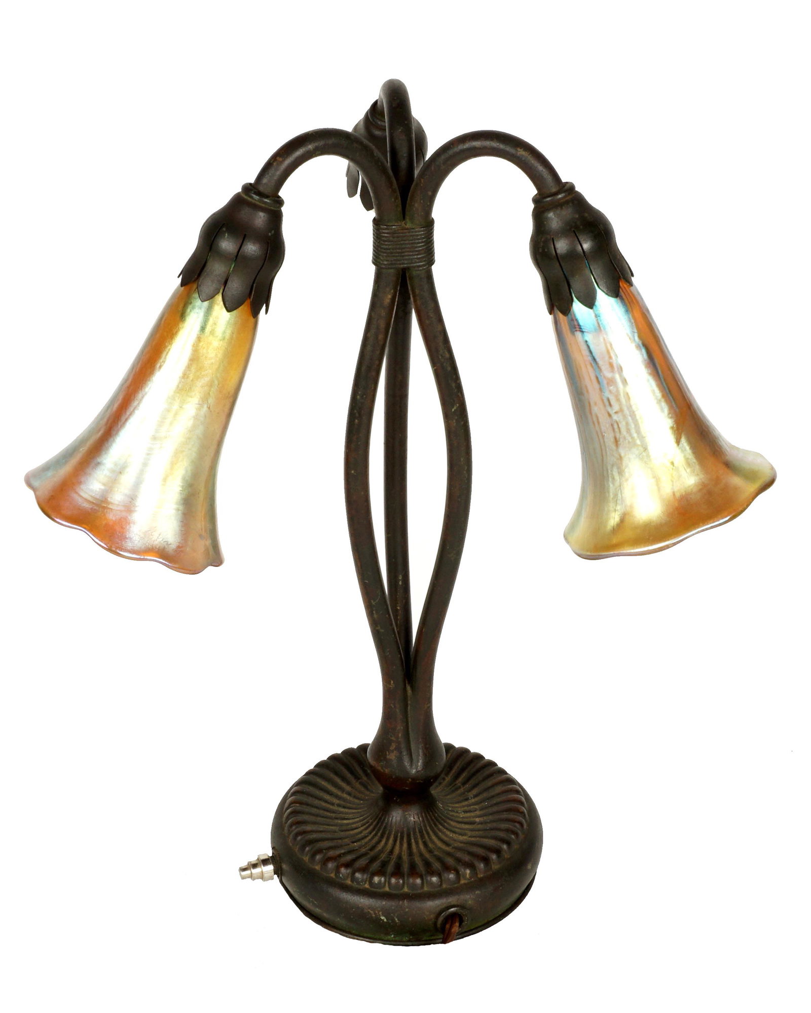 Tiffany Studios Bronze Three Light Lily Table Lamp: Patinated bronze three light "Lily" table lamp, well marked on base Tiffany Studios, New York, 319. 12.75" h. x 6" dia. Sold with two shades. Condition: Replacement switch, two sockets replaced.