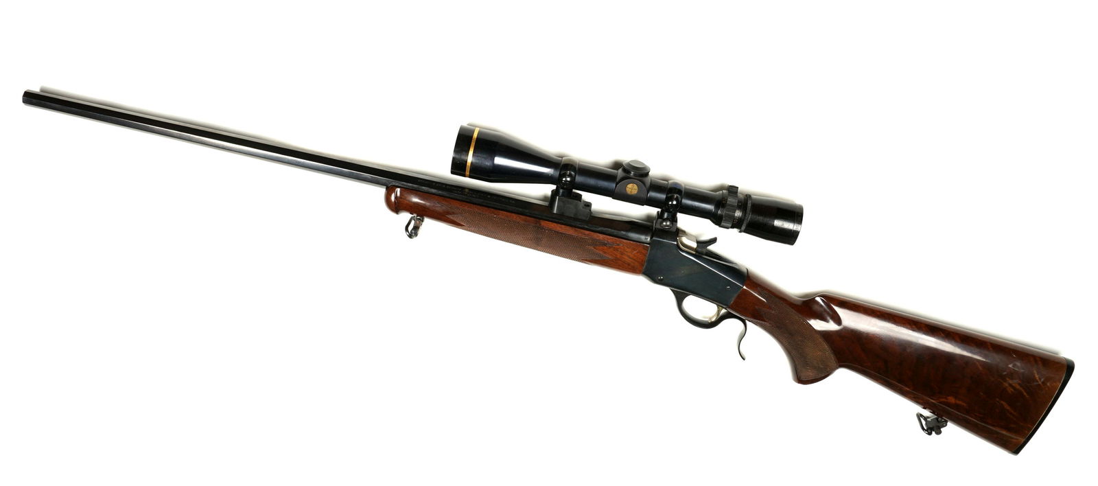Japanese Browning Model 1885 Rifle with Scope: Browning Model 185 single shot falling block rifle, made in Japan, .22 Hornet caliber 24" blued octagon barrel, checkered wood stock, Leupold Vari-X III 3.5 x 10 scope, serial number 04595NT2L7. Overa