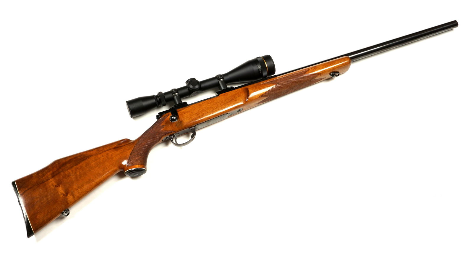 Rare Sako Forester L579 .244 Rem Bolt Action Rifle: Sako Forester L579 in rare .224 caliber, 23" blued round barrel, bolt action single shot, checkered wood grip, Leupold VX-II 6-18 x 40mm scope, serial number 11325. Overall 4.25" long, length to pull