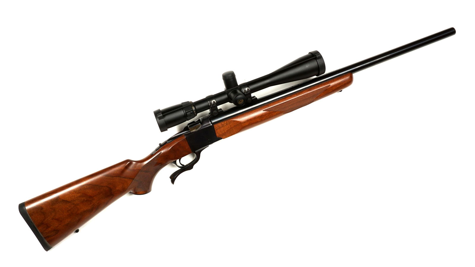 Sturm Ruger No.1 Falling Block Rifle with Scope: Sturm, Ruger, No. 1 single shot underlever, .223 Remington caliber, 24" blued round barrel, checkered wood stock, Nikon Buckmaster scope, serial number 134-20676. Overall 40.5" long, length of pull 13