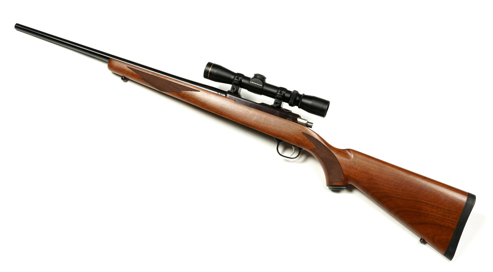 Ruger 77/17 Mach 2 Bolt Action Rifle with Scope: Ruger 77/17 Mach 2, .17 M2 caliber 20" blued round barrel, Checkered wood stock, Leupold VX I scope, serial number 703-36971, Overall 39.25" long, length of pull 13.75". Condition: Minor scratches to