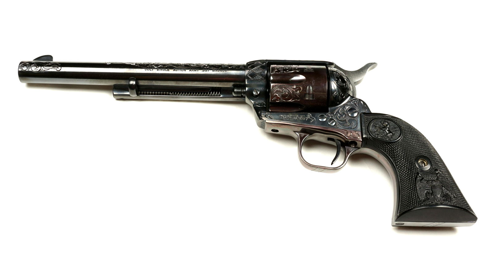 Nice Colt Engraved Colt .357 Magnum Single Action: Engraved frame and barrel Single Action revolver, model P1670, .357 caliber 7.5" barrel, composite grips with eagles, serial number SA09053. Overall 12.75". Sold with original box. Ships to FFL, an ad
