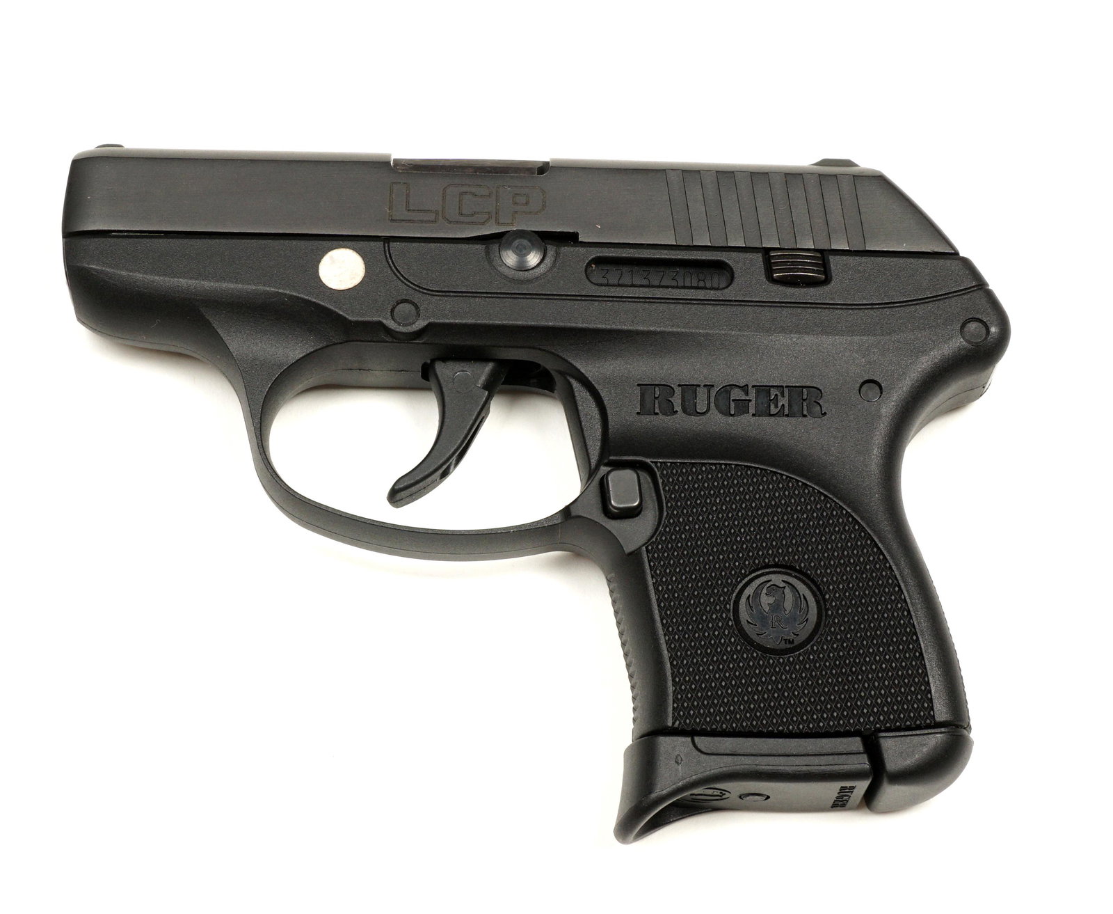 Ruger LCP .380 Semi Automatic Pistol: Ruger LCP, .380 caliber 2.5" black oxide barrel, composite nylon frame, , serial number 371373080, overall 5.25". Condition: Overall excellent. Ships to FFL, an additional $45 transfer fee and shippin
