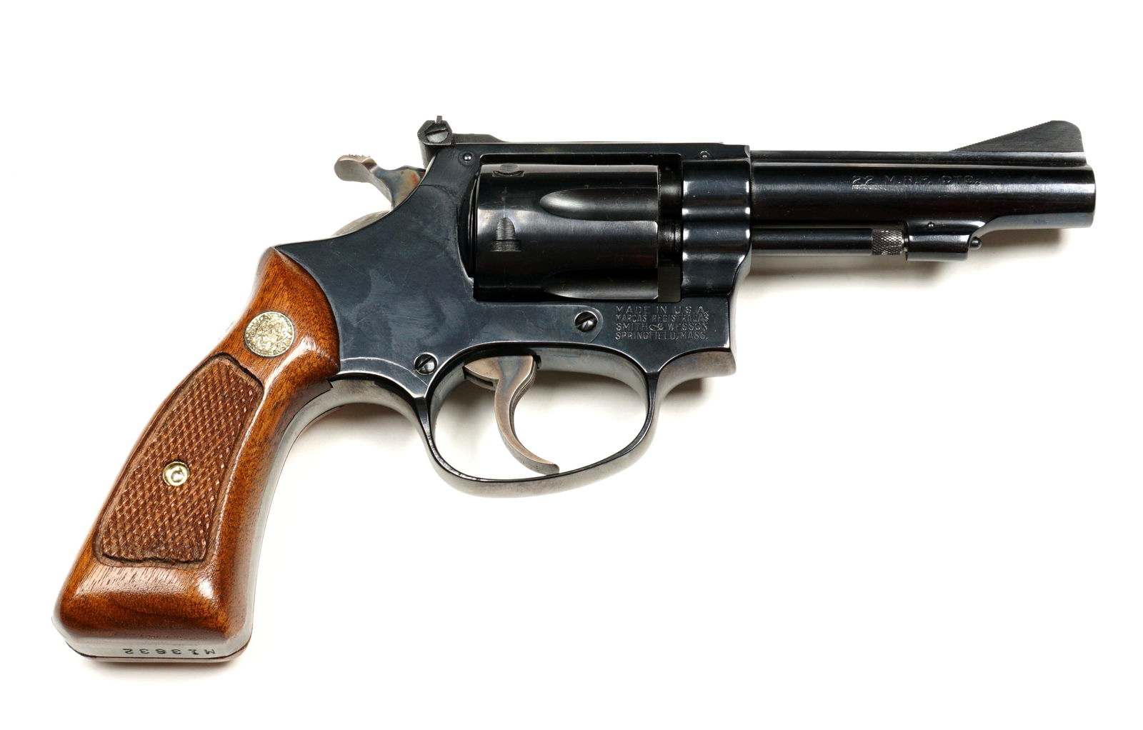 Smith & Wesson Model 51 .22 Magnum Revolver: Circa 1969-1975, Smith & Wesson Model 51 .22MRF caliber 3.5" blued barrel and frame, checkered wood grips, with original box and accessories, serial number M13632. Overall 8.25". Condition: Overall ex