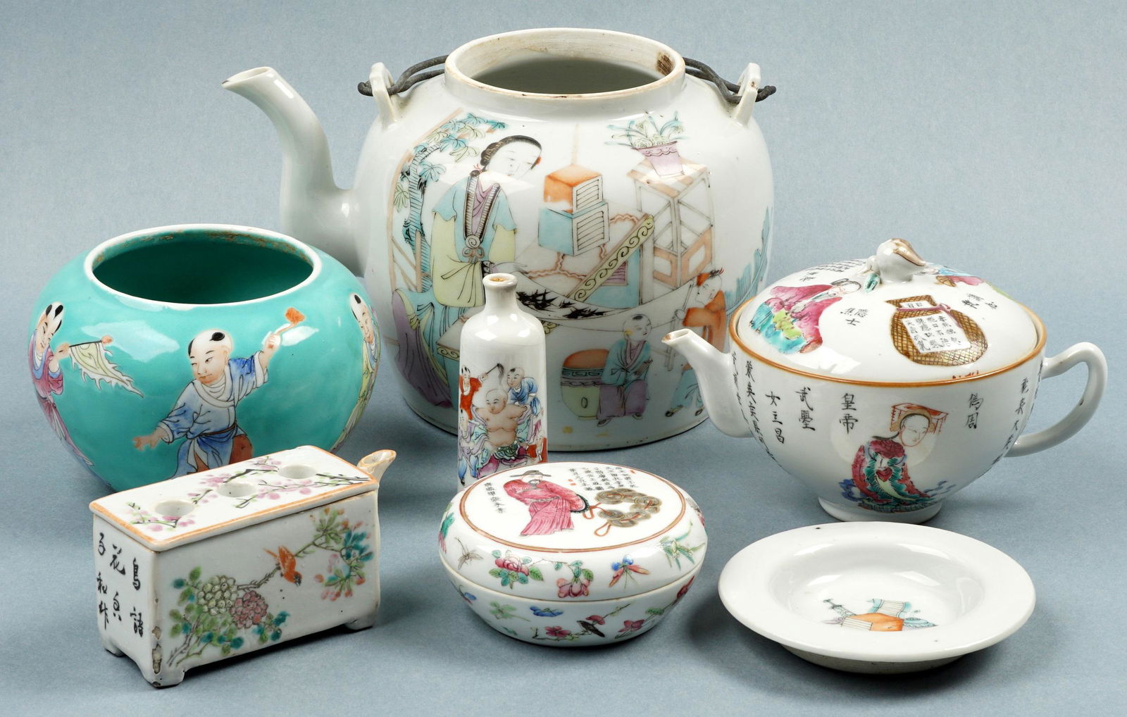 Seven Piece Chinese Porcelain Items: Seven pieces total, 19th/20th Century, to include 1) Famille Rose teapot, metal handles, 5.25" h. x 8". stamped 4 character mark. No lid 2) Famille Rose covered round box, 1.75" x 3.5". 3) Small Famil
