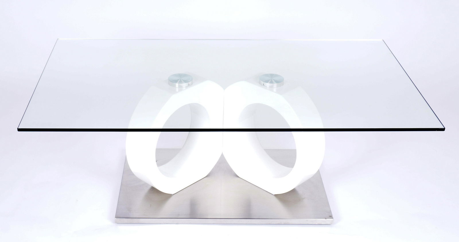 Contemporary Glass Top Coffee Table: Rectangular glass top over canted white lacquered circle supports on brushed metal base. Overall with top 16.75" h. x 47.25" x 27.5".