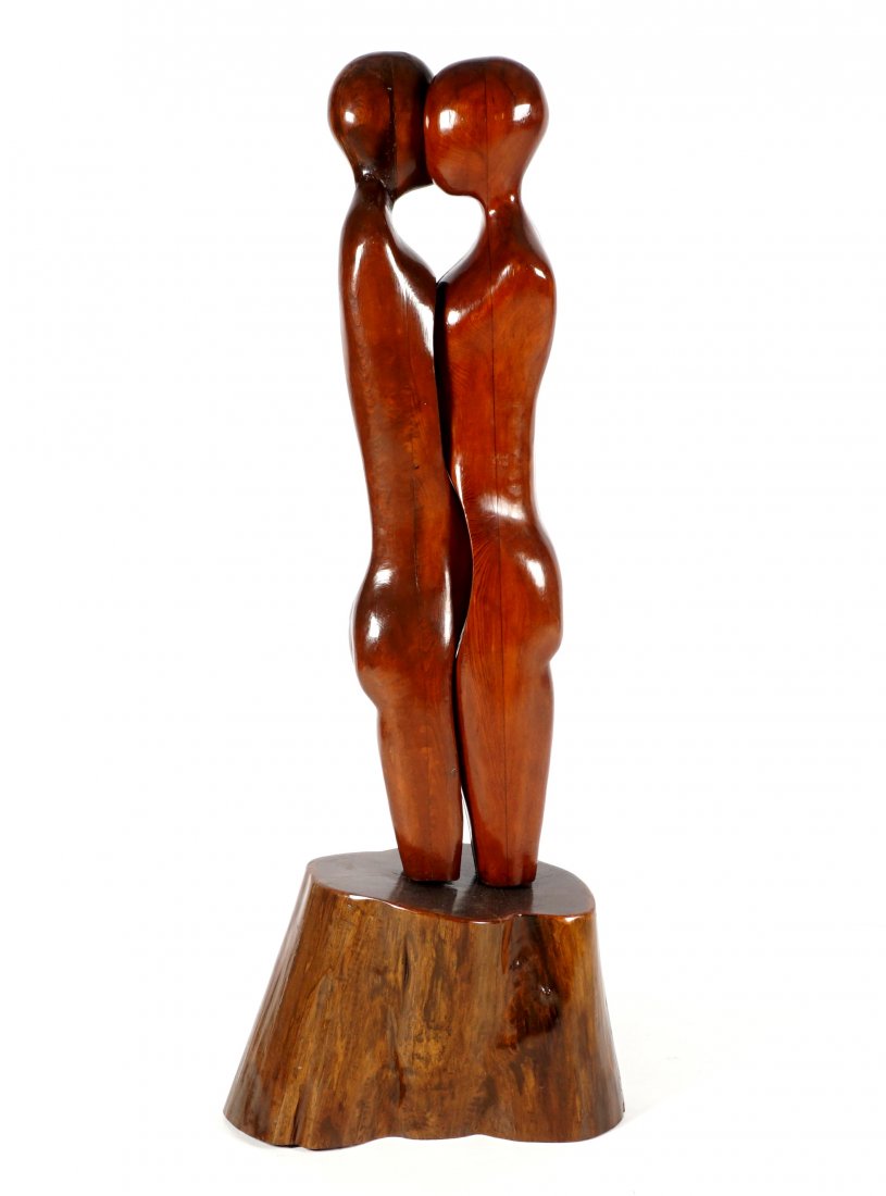 Mid Century Modern Carved Cypress Sculpture of Lovers: Large Abstract modernist sculpture of two lovers in embrace, on cypress wood plinth, no visible signature, overall 61.5 "x 23" x 12". Chips to base