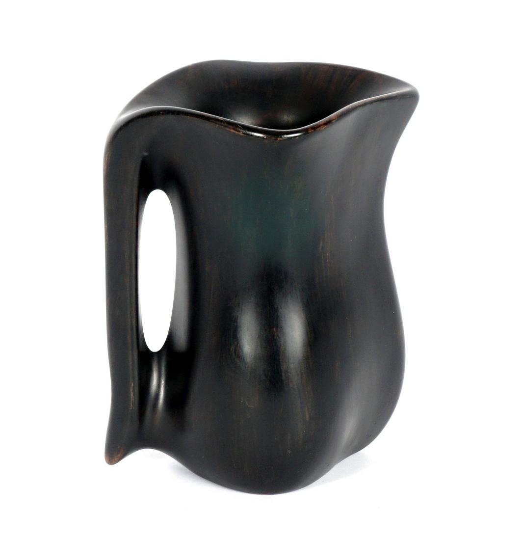 Alexandre Noll Carved Ebony Pitcher: NOLL, Alexandre, (French, 1890-1970): Carved ebony pitcher, inscribed ANoll on base, overall measure 6.25" h. x 4.75".