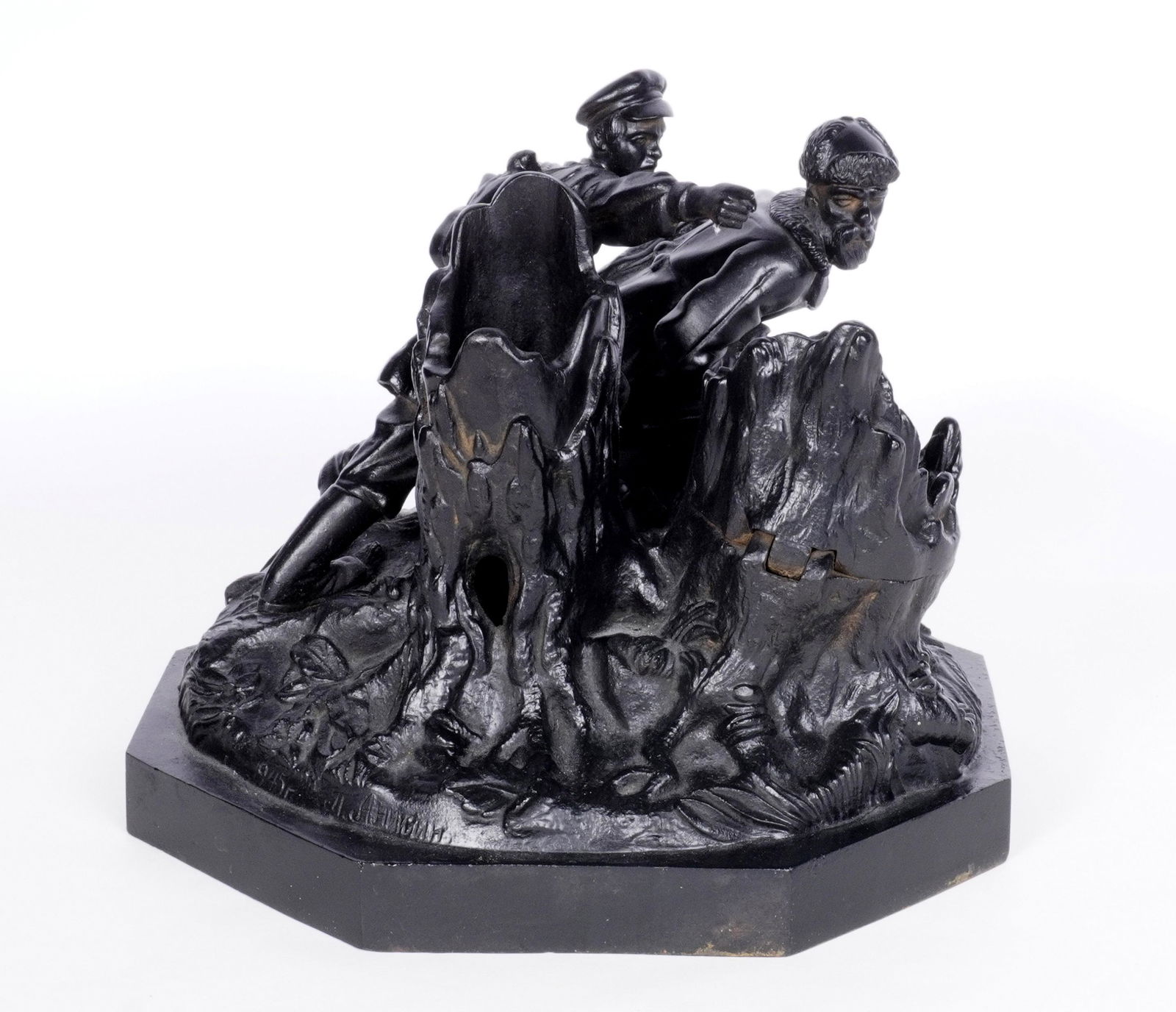 Large Kasli Russian Propaganda Figural Inkwell: Large cast iron inkwell featuring two figural soldiers behind tree stumps, on stump opens for inkwell (missing insert), the other is a pen holder. Signed and dated 1945, overall 8.5" h. x 10" x 10".