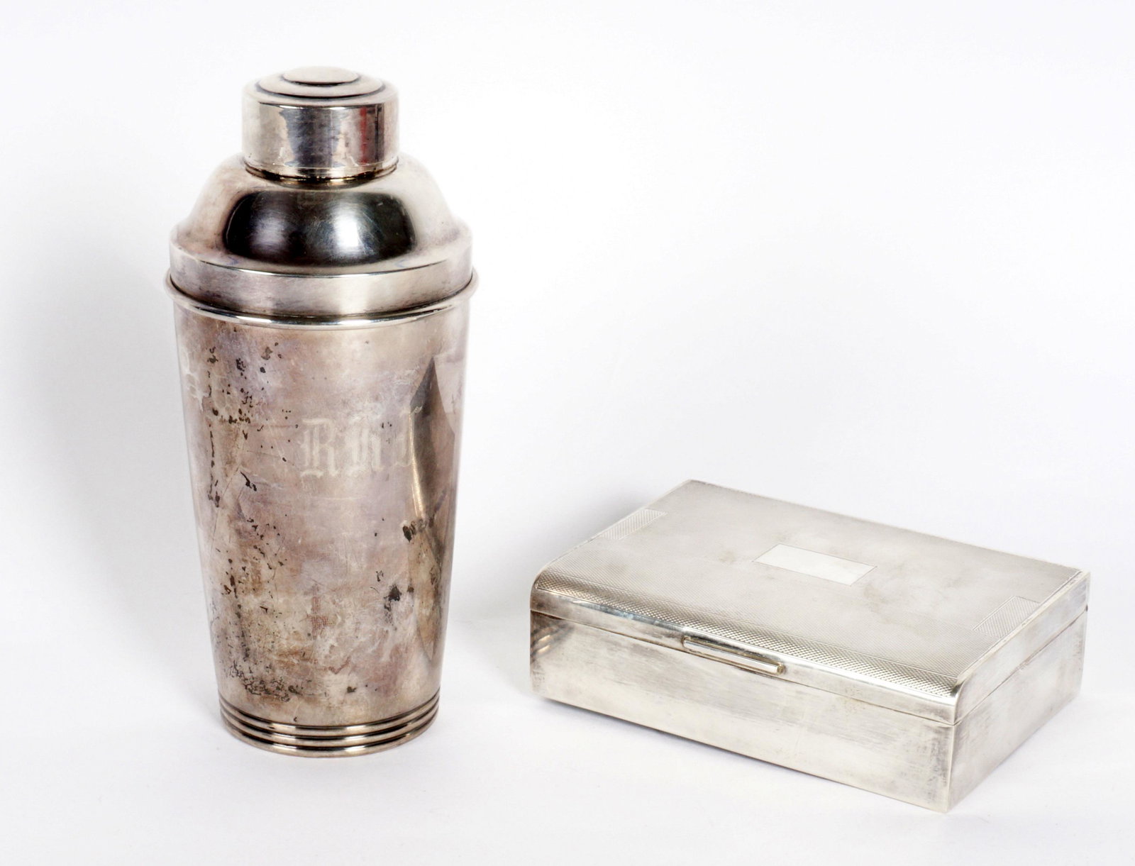 Sterling Silver Cocktail Shaker and Box: Two pieces total to include 1) S. Kirk & Sons cocktail shaker, approx. 8.2 troy oz. 6.75" h. x 3". 2) Wood lined hinged lid box, Charles S. Green & Co., Birmingham, 1974. 1.25" x 5" x 3.25".