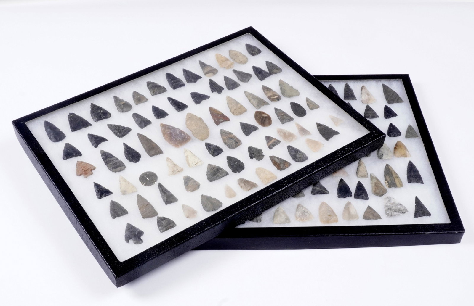 Collection of Pee Dee and Mississippian Points: An assembled collection of approx. 156 points, assorted sizes and construction, sold with 2 Riker mounts, 16.25" x 12.25".